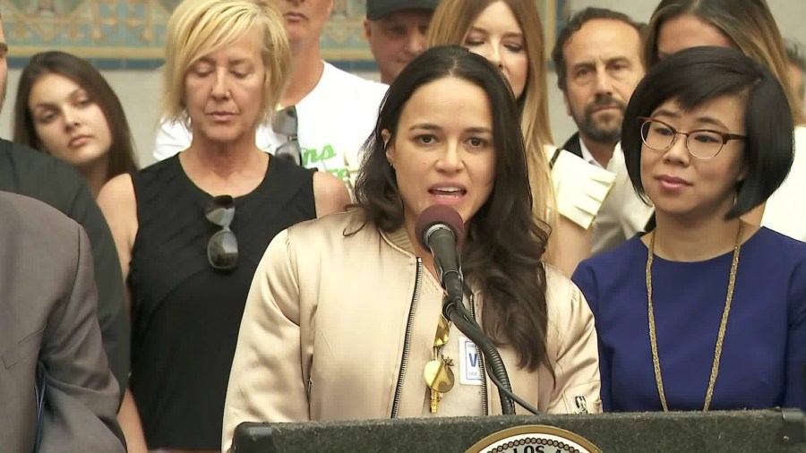 Michelle Rodriguez was among celebrities and local politicians who spoke during a news conference criticizing Donald Trump's trophy ban reversal on Nov. 20, 2017. (Credit: KTLA)