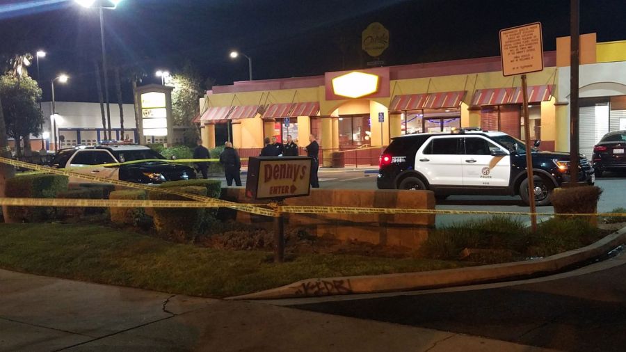 Police respond to a shooting outside a Denny's restaurant on Dec. 15, 2017 (Credit: Chris Gierowski, KTLA)