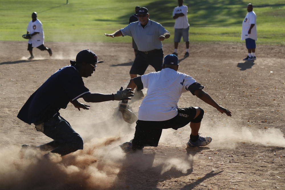 The game action at home plate at the Crips softball championship in Torrance in October, 2017. (Credit: Allen J. Schaben / Los Angeles Times)