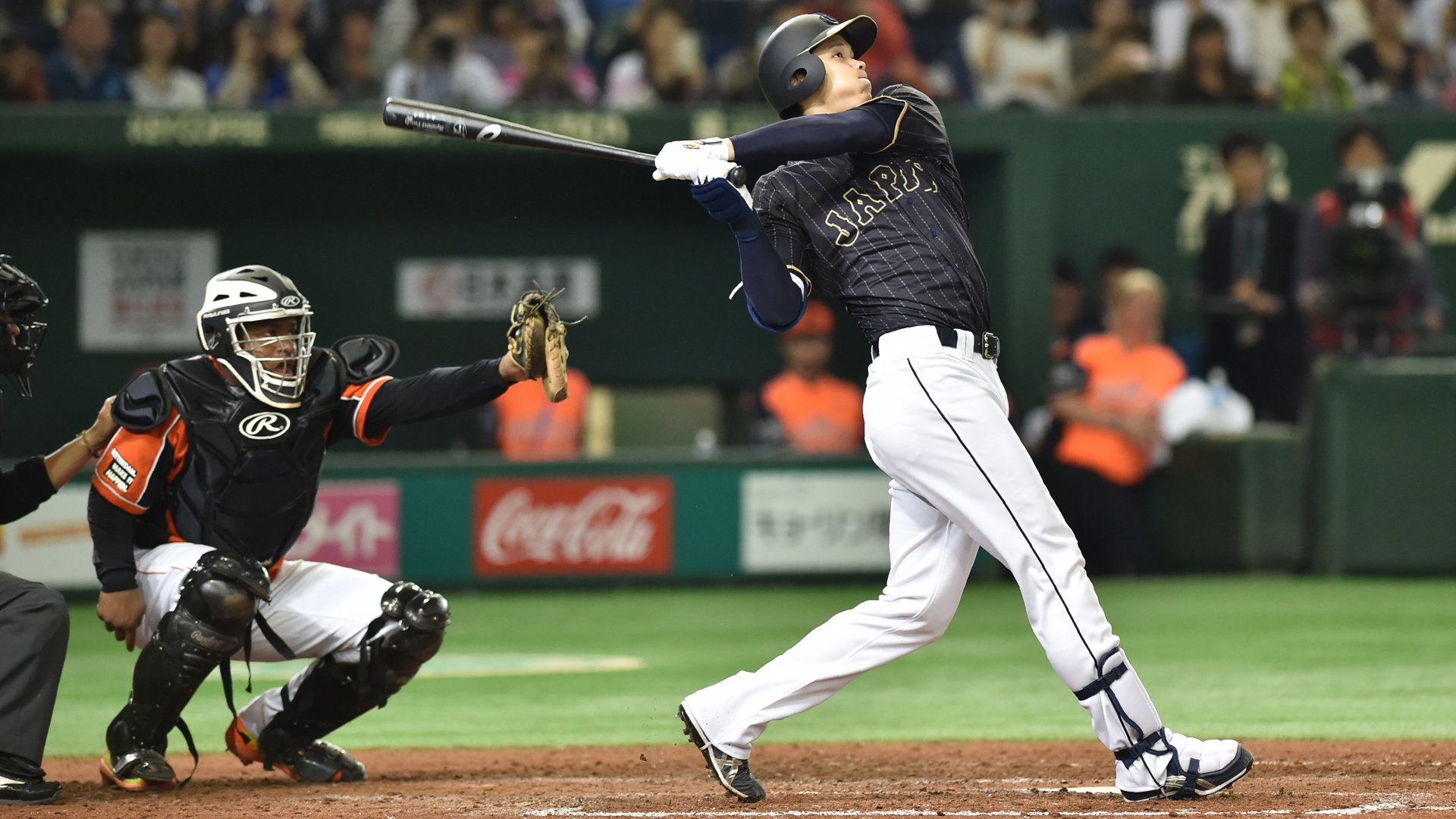 Japan's Shohei Ohtani hits a double in the seventh inning during the international friendly baseball match between Japan and the Netherlands at the Tokyo Dome on Nov. 13, 2016. (Credit: KAZUHIRO NOGI/AFP/Getty Images)