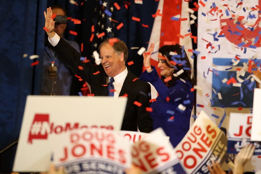 Senator-elect Doug Jones and wife Louise Jones greet supporters during his election night gathering the Sheraton Hotel on Dec. 12, 2017, in Birmingham, Alabama. (Credit: Justin Sullivan/Getty Images)