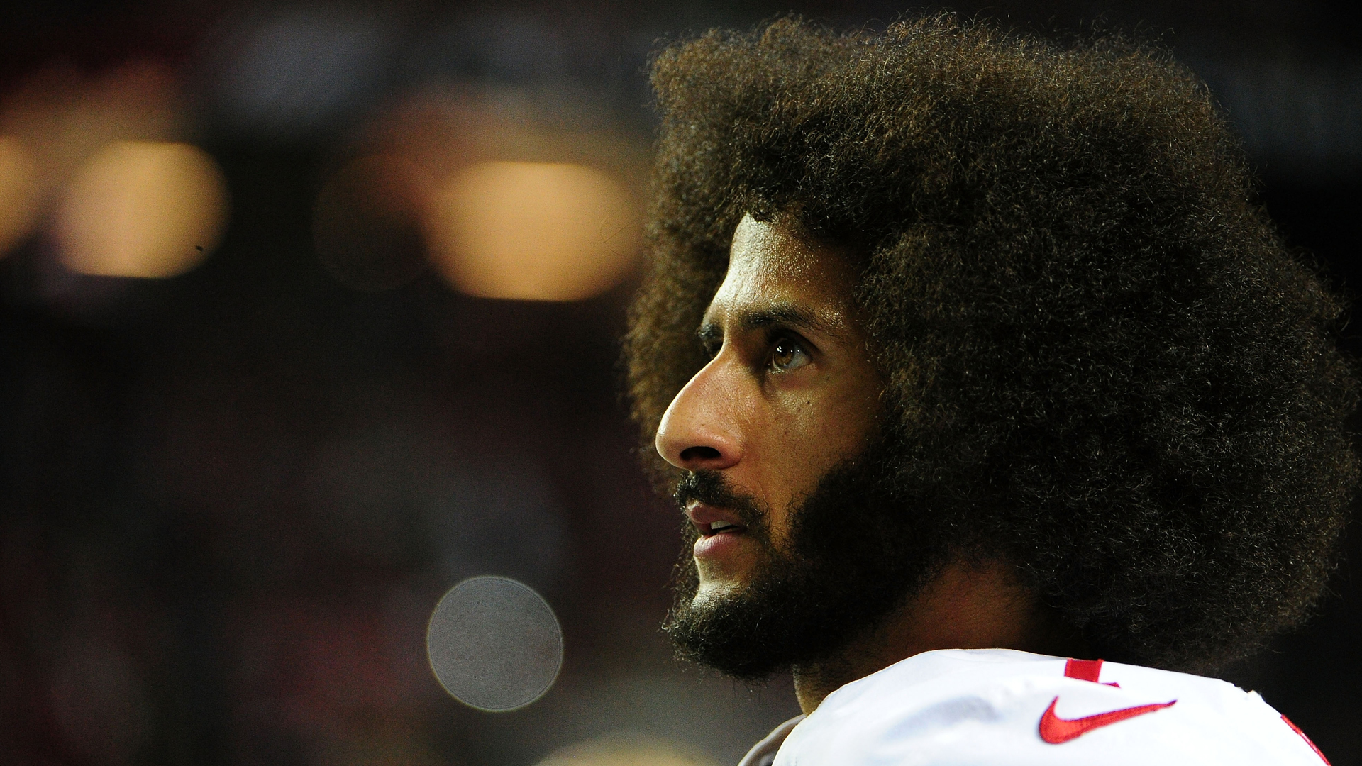 Colin Kaepernick, as #7 of the San Francisco 49ers, looks on from the sidelines during the second half against the Atlanta Falcons at the Georgia Dome on Dec. 18, 2016, in Atlanta. (Credit: Scott Cunningham/Getty Images)