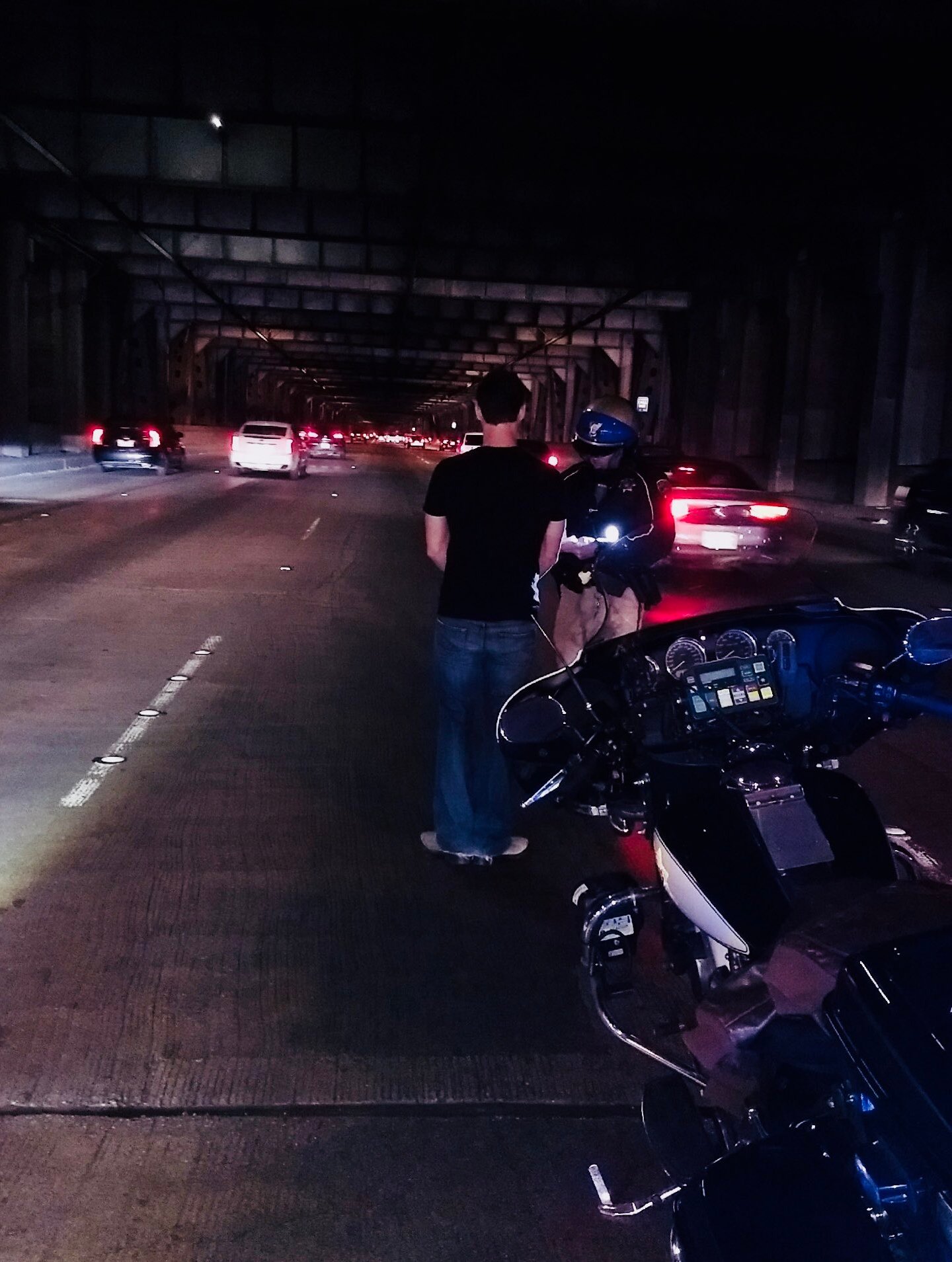 A Tesla driver suspected of drunken driving is seen being arrested on the Bay Bridge in San Francisco on Jan. 19, 2018, in a photo released by the California Highway Patrol.