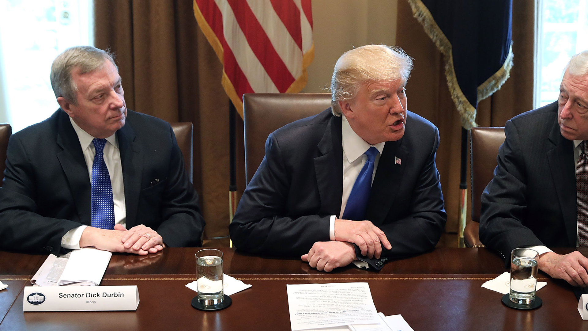 Sitting to the left of U.S. President Donald Trump at a meeting on immigration reform is Senate Minority Whip Richard Durbin (D-IL) while House Minority Whip Steny Hoyer (D-MD) is sitting on the right side. Durbin said Trump referred to some African nations as "shithole countries" during that same meeting, on Jan. 9, 2018. (Credit: Chip Somodevilla/Getty Images)