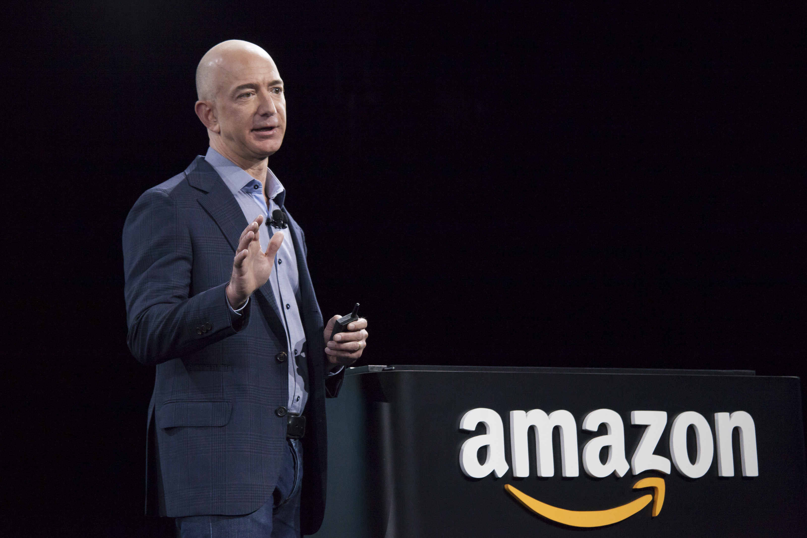 Amazon.com founder and CEO Jeff Bezos presents the company's first smartphone, the Fire Phone, on June 18, 2014 in Seattle, Washington. (Credit: David Ryder/Getty Images)