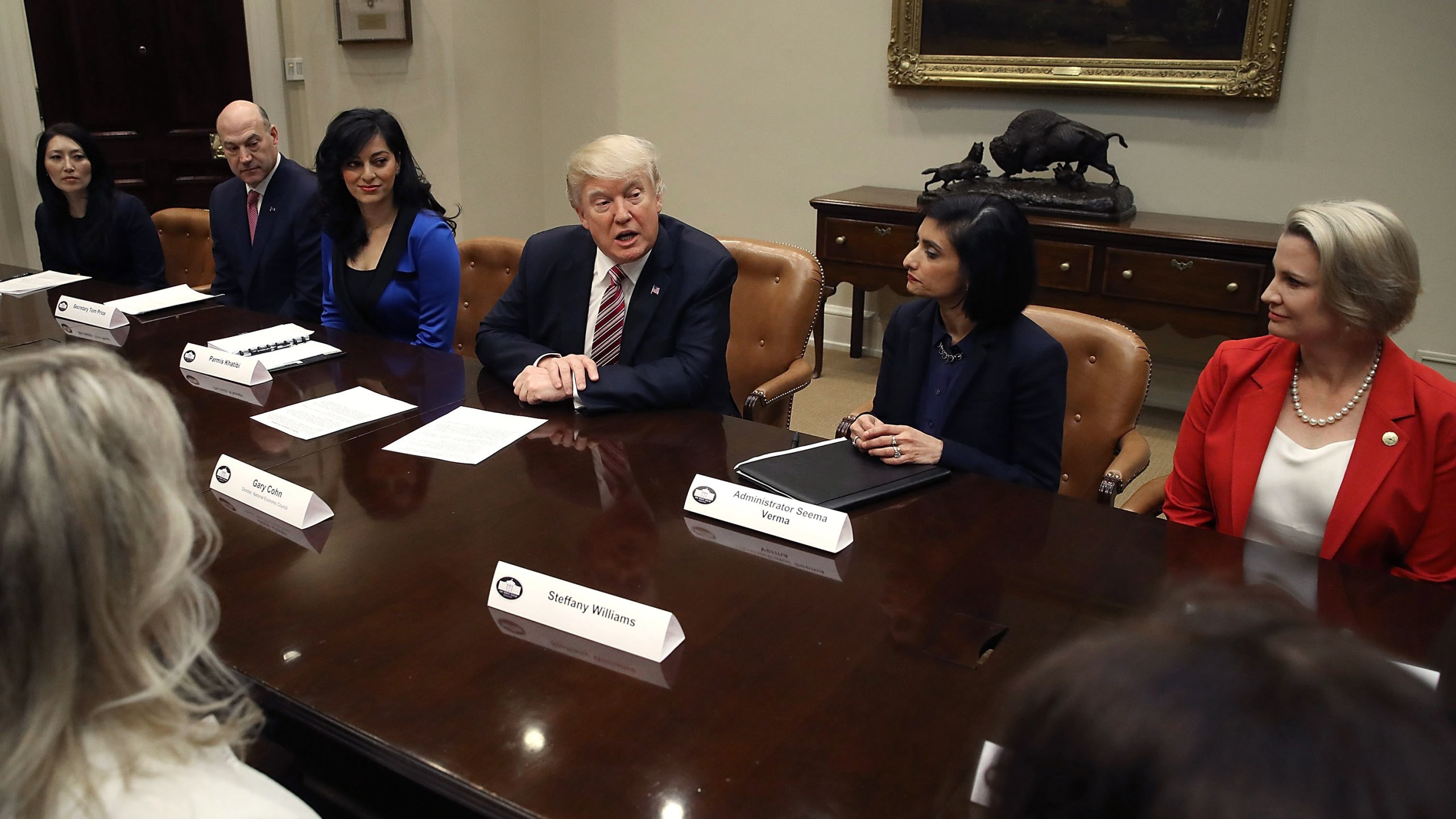 President Donald Trump speaks to participants of a women in healthcare panel hosted by Centers for Medicare and Medicaid Services head Seema Vermain, second from right, in the Roosevelt Room at the White House, March 22, 2017. (Credit: Mark Wilson / Getty Images)