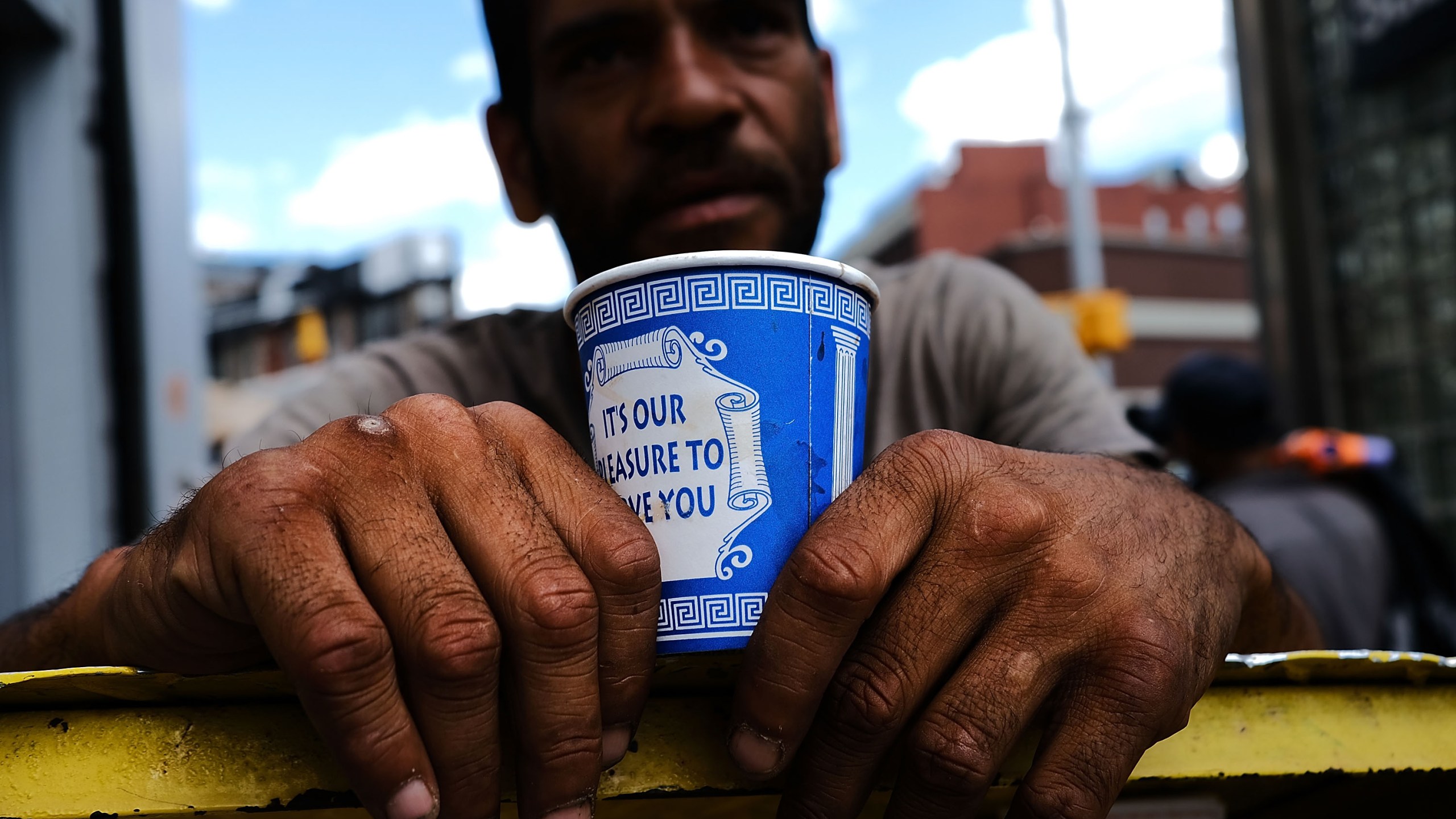 A man panhandles in the Bronx borough of New York City on June 28, 2017. (Credit: Spencer Platt / Getty Images)