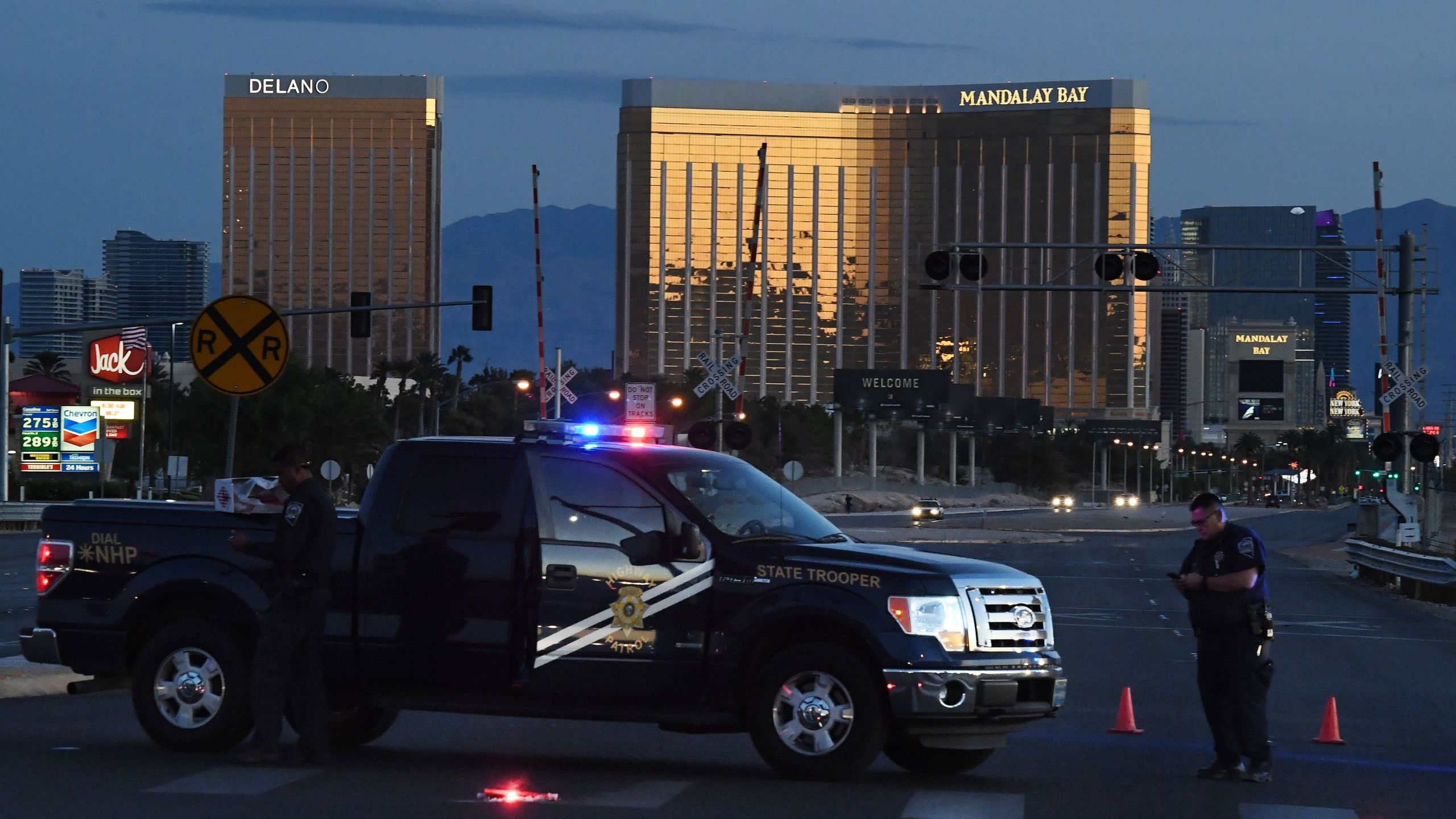 Police form a perimeter around the road leading to the Mandalay Hotel after a gunman opened fire on a country music concert in Las Vegas, Nevada on Oct. 2, 2017. (Credit: MARK RALSTON/AFP/Getty Images)