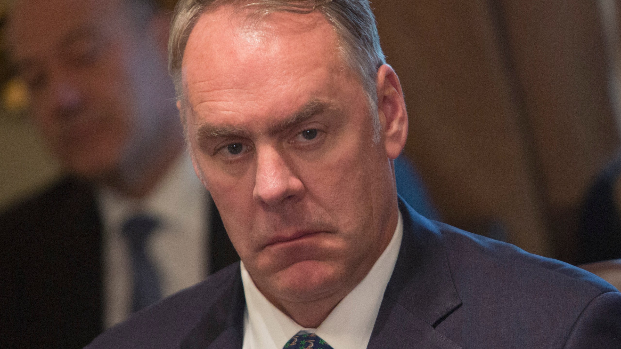 U.S. Secretary of the Interior Ryan Zinke listens during a Cabinet meeting at the White House December 20, 2017 in Washington, DC. (Credit: Chris Kleponis-Pool/Getty Images)