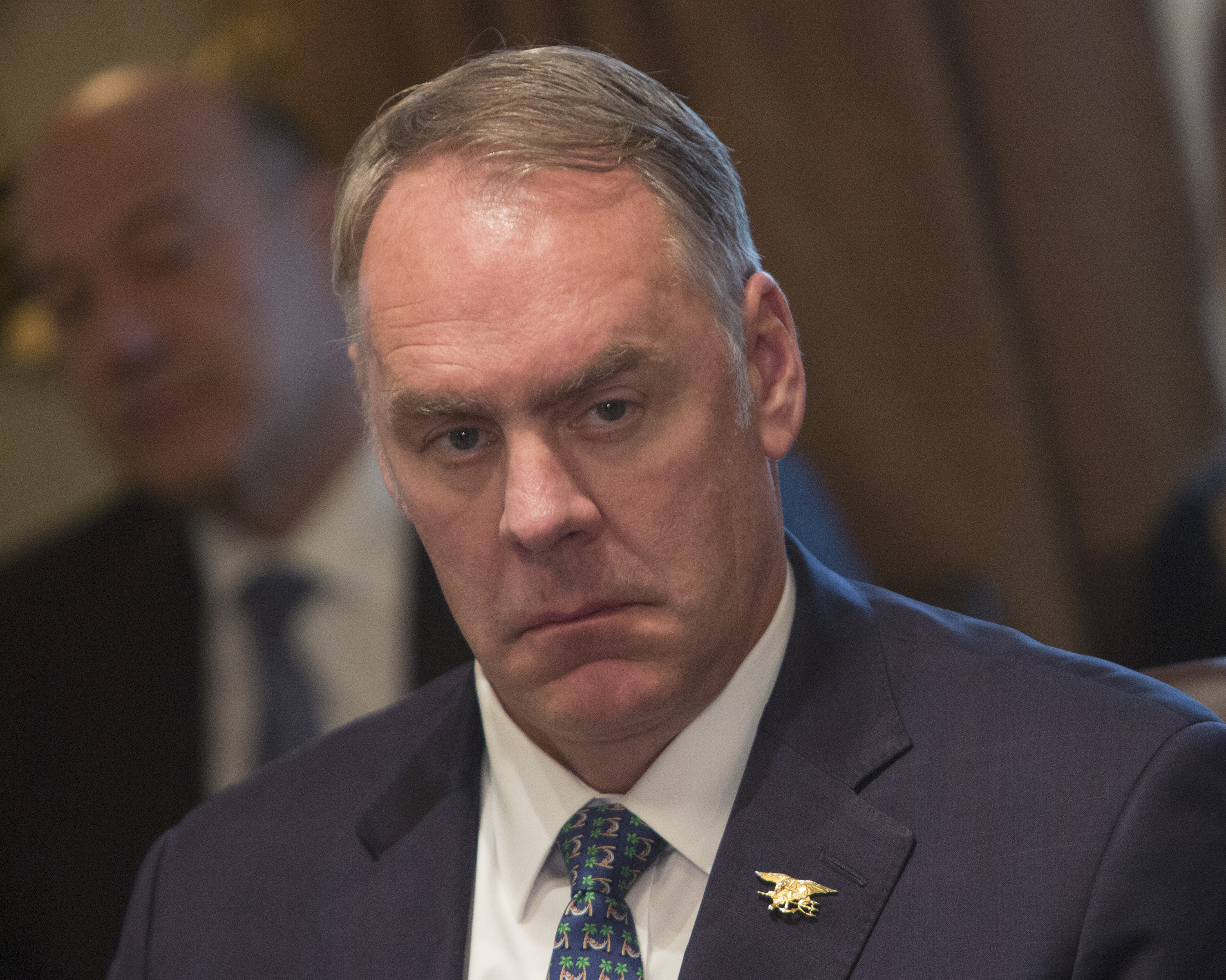 U.S. Secretary of the Interior Ryan Zinke listens during a Cabinet meeting at the White House December 20, 2017 in Washington, DC. (Credit: Chris Kleponis-Pool/Getty Images)