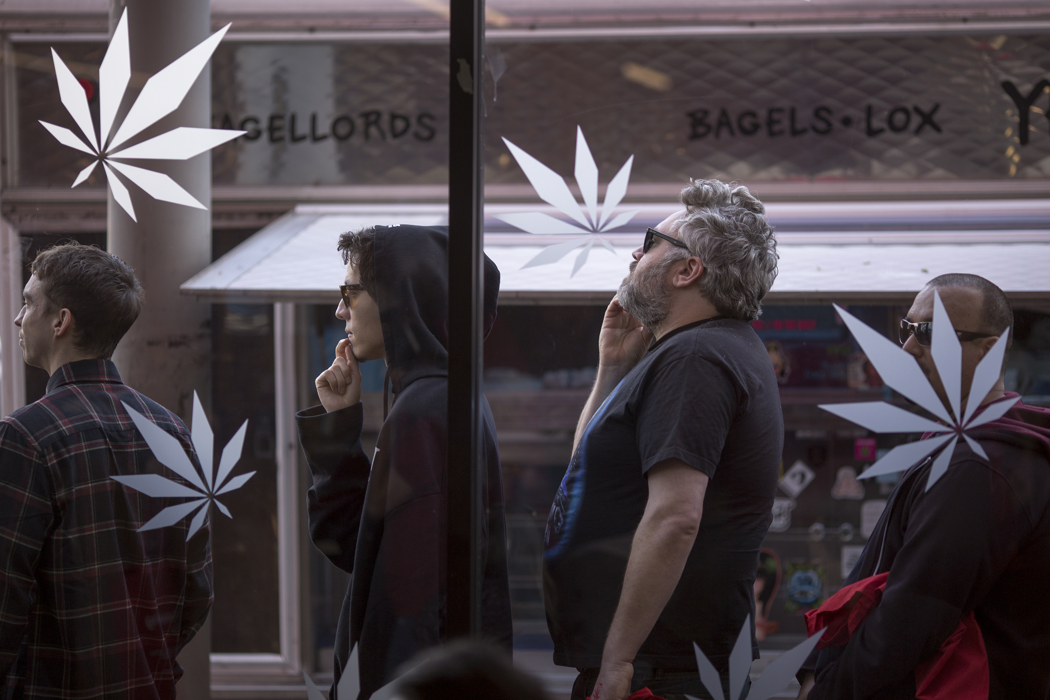 People stand in line to get into MedMen, one of two Los Angeles area pot shops that began selling marijuana for recreational use under the new California marijuana law on Jan. 2, 2018, in West Hollywood. (Credit: David McNew / Getty Images)