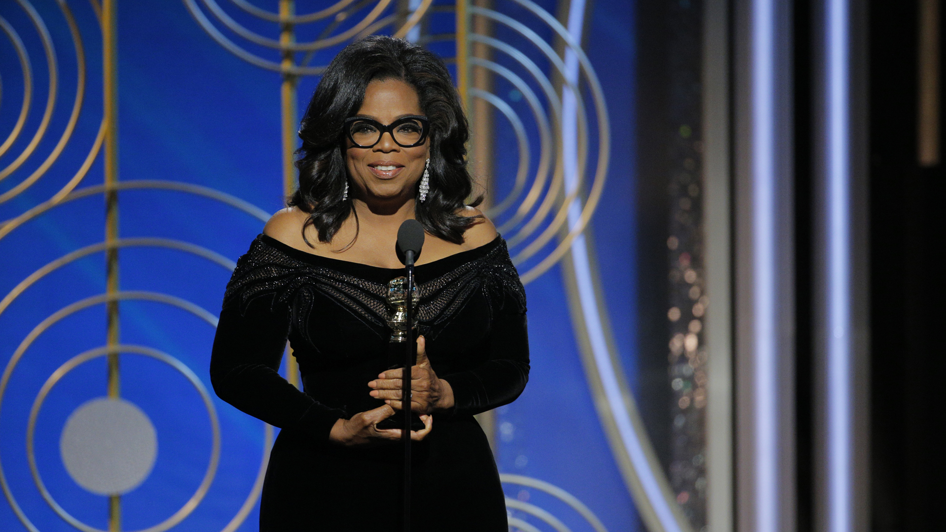 In this handout photo provided by NBCUniversal, Oprah Winfrey accepts the 2018 Cecil B. DeMille Award speaks onstage during the 75th Annual Golden Globe Awards at The Beverly Hilton Hotel on January 7, 2018s. (Credit: Paul Drinkwater/NBCUniversal via Getty Images)