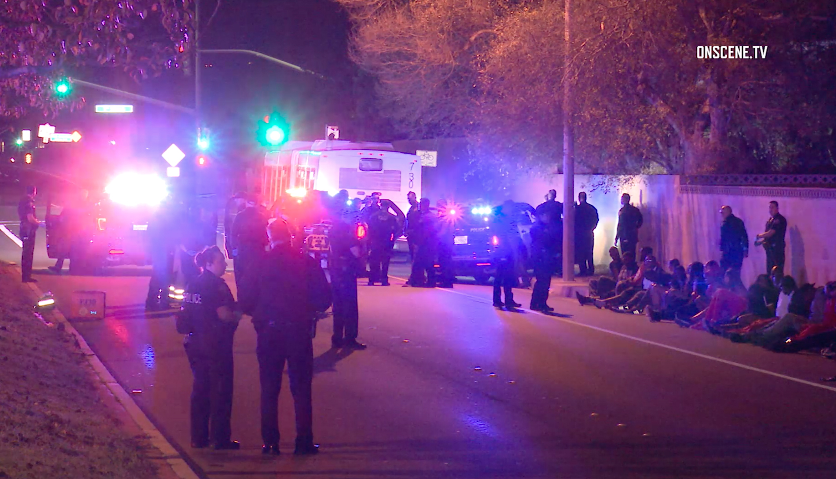 Several law enforcement agencies assisted in detaining people on a party bus who are believed to have been involved in a robbery at a Seal Beach CVS on Jan. 13, 2018. (Credit: OnScene.TV)