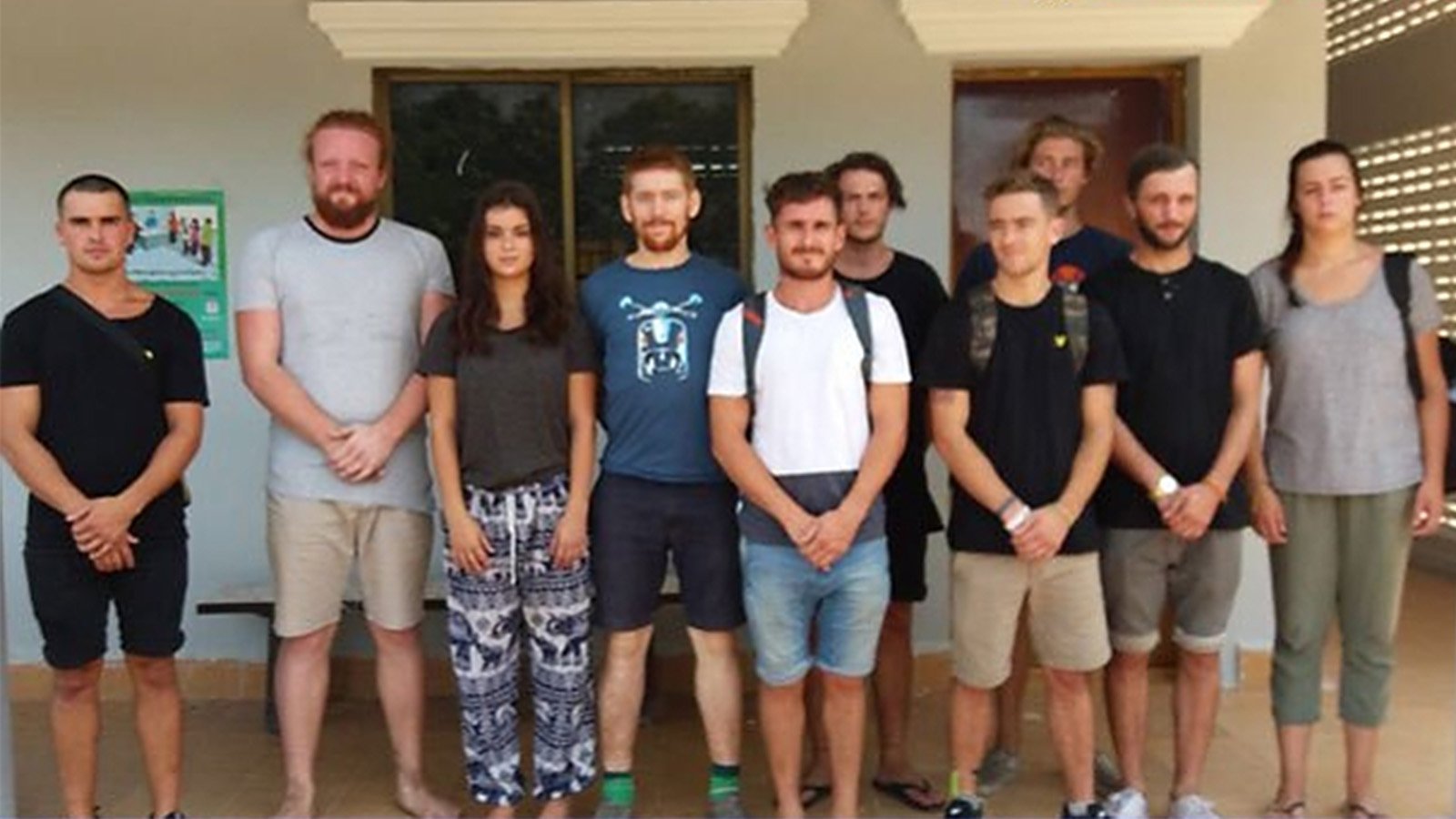 A group of foreigners who were arrested for "dancing pornographically" at a party in Siem Reap town, according to Cambodian National Police. (Credit: Cambodia National Police/AP)