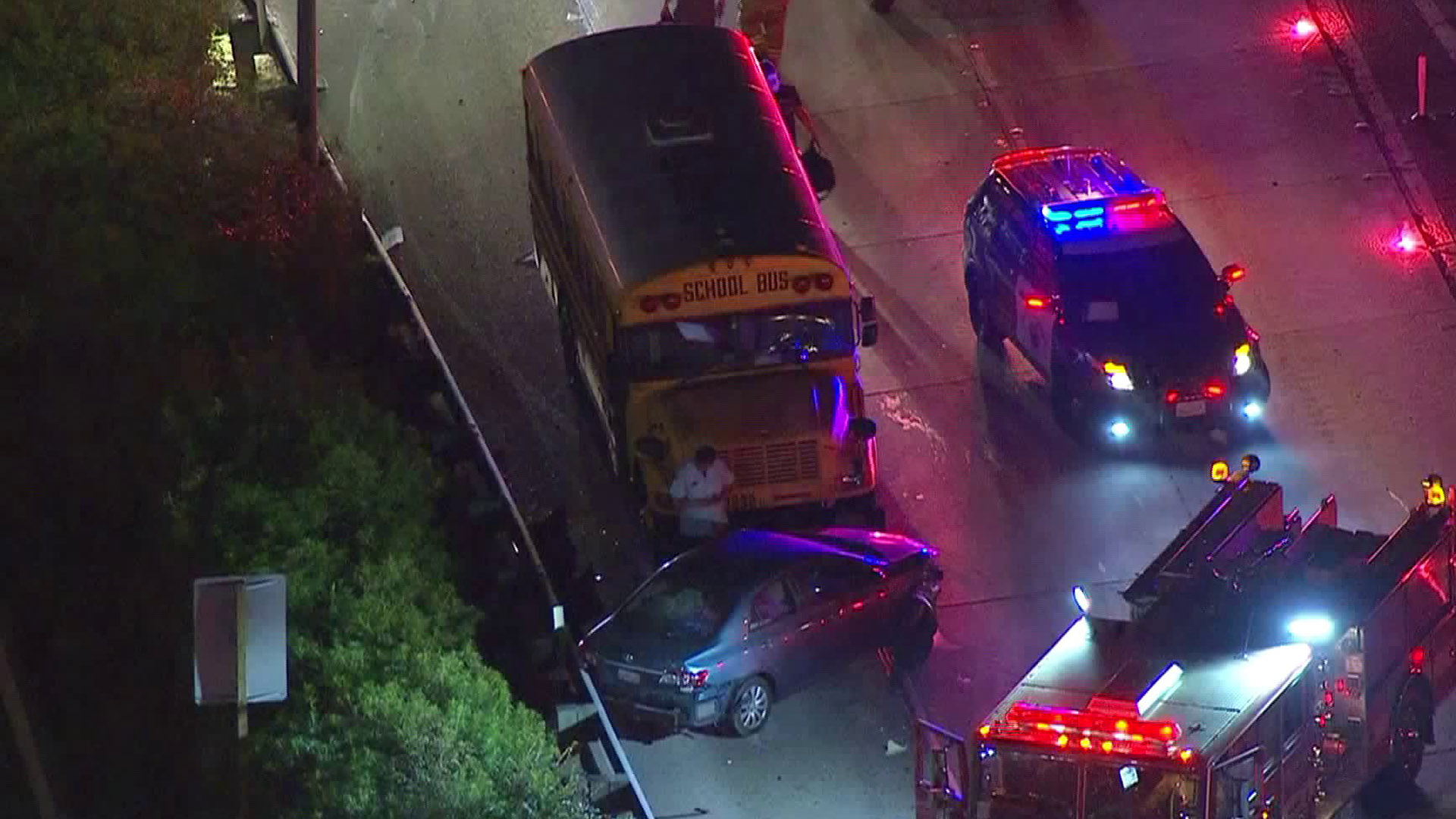 A school bus involved in a collision with an ambulance and a sedan is seen on the 405 Freeway on Jan. 31, 2018. (Credit: KTLA)