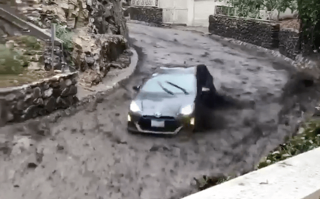 A Toyota Prius careens down a Burbank street during a mudflow on Jan. 9, 2018. (Credit: Burbank Firefighters Local 778)