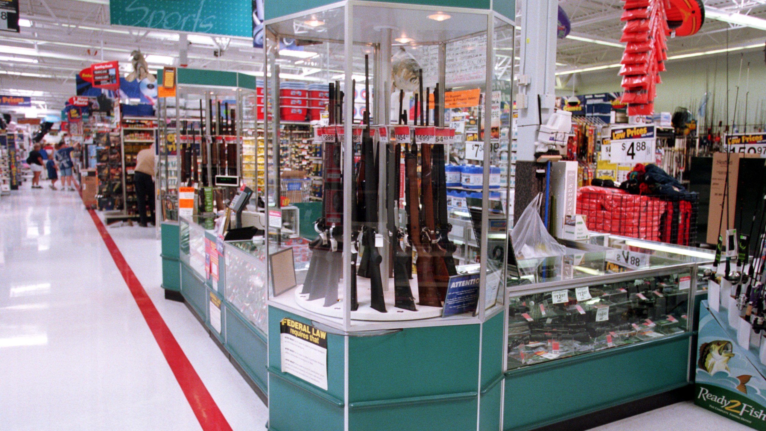 Guns are shown for sale at a Wal-Mart on July 19, 2000. (Credit: Getty Images)