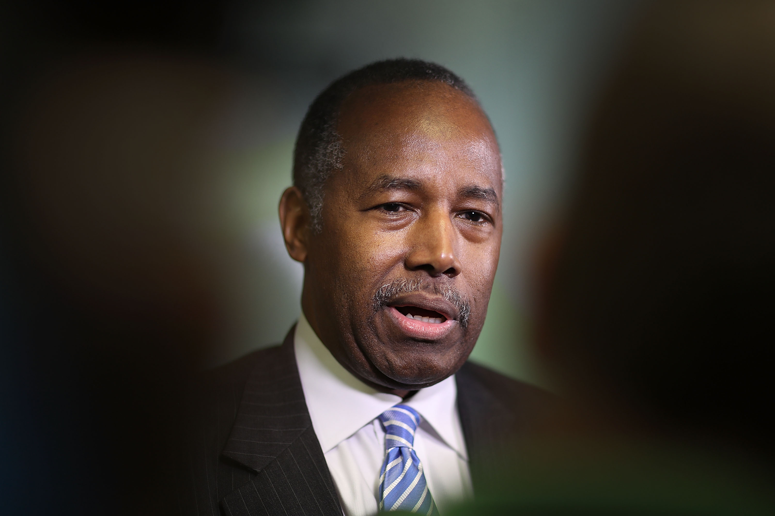 Housing and Urban Development Secretary Ben Carson speaks to the media during a visit to the Liberty Square apartment complex in Miami, Florida, on April 12, 2017. (Credit: Joe Raedle / Getty Images)