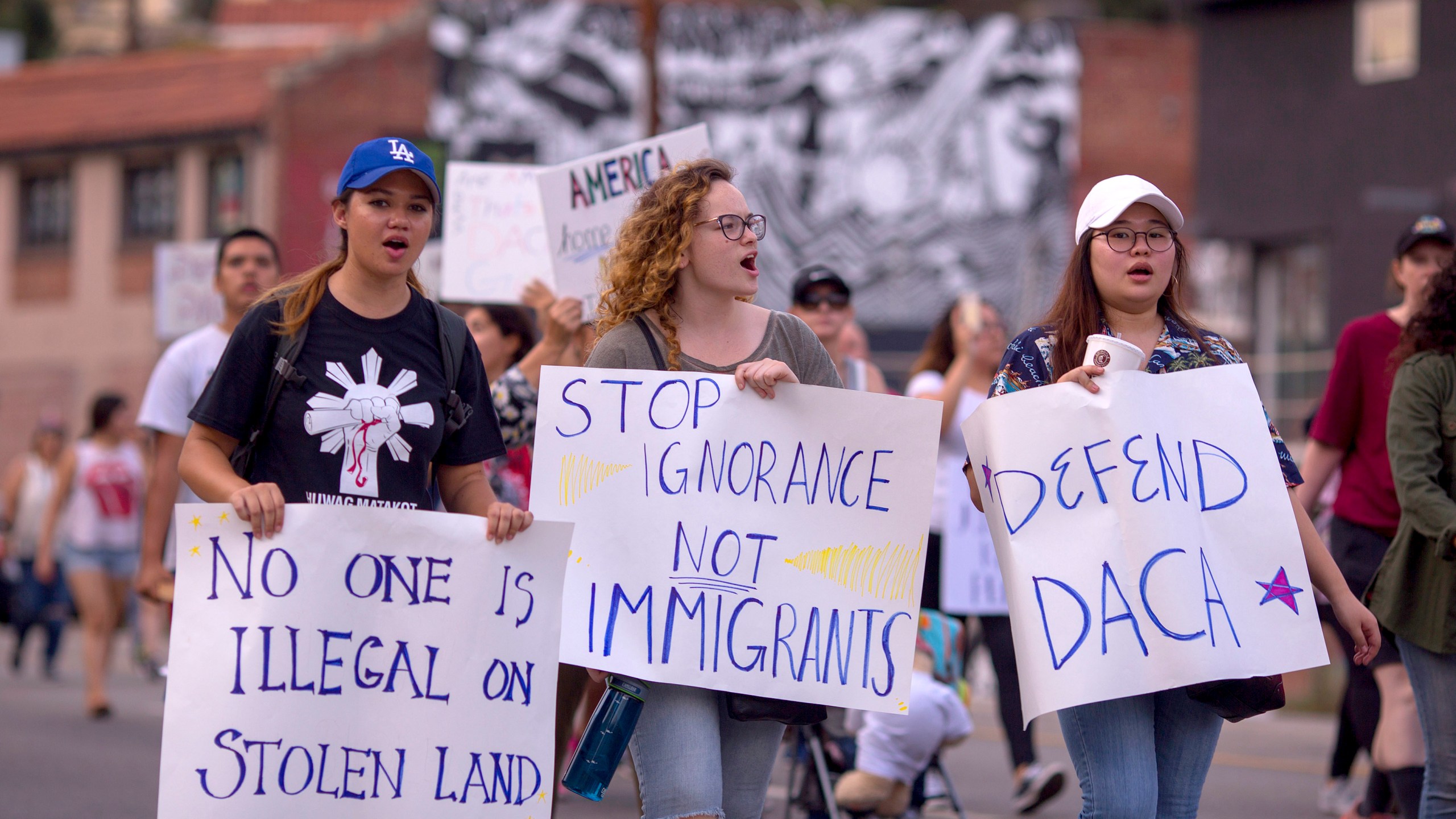 Advocates participate at a march to oppose President Donald Trump's order to end DACA on Sept. 10, 2017 in Los Angeles. (Credit: David McNew/Getty Images)