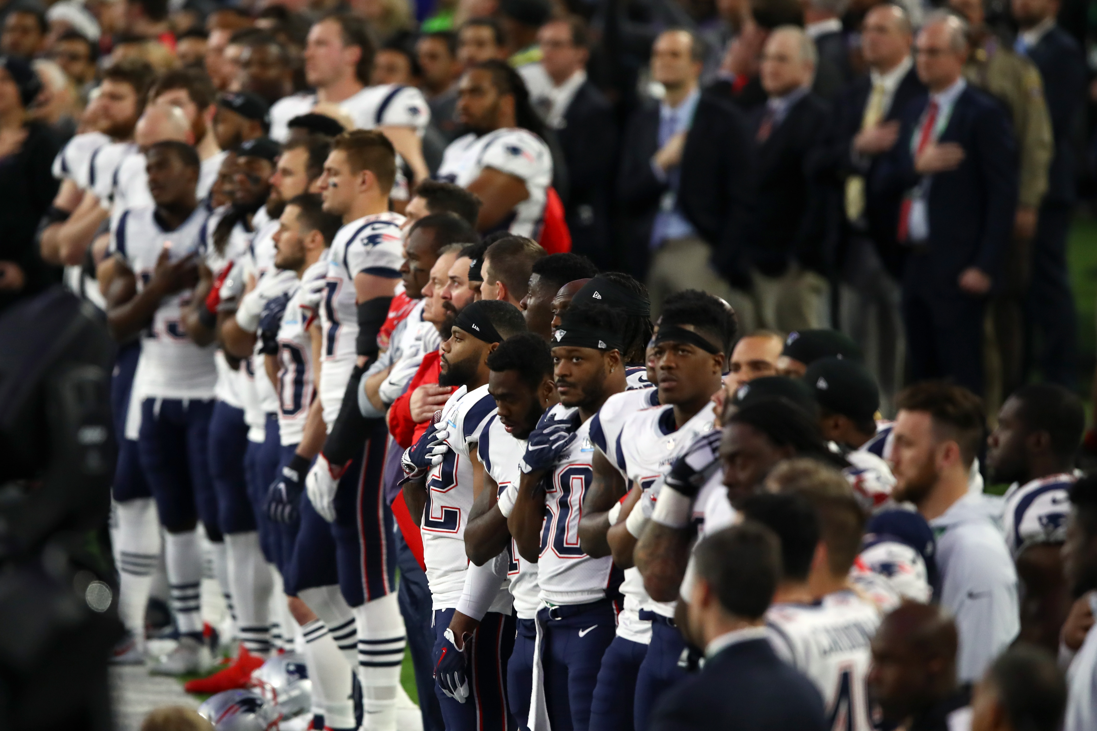 The New England Patriots stand during the National Anthem prior to Super Bowl LII against the Philadelphia Eagles at U.S. Bank Stadium on Feb. 4, 2018, in Minneapolis. (Credit: Gregory Shamus/Getty Images)