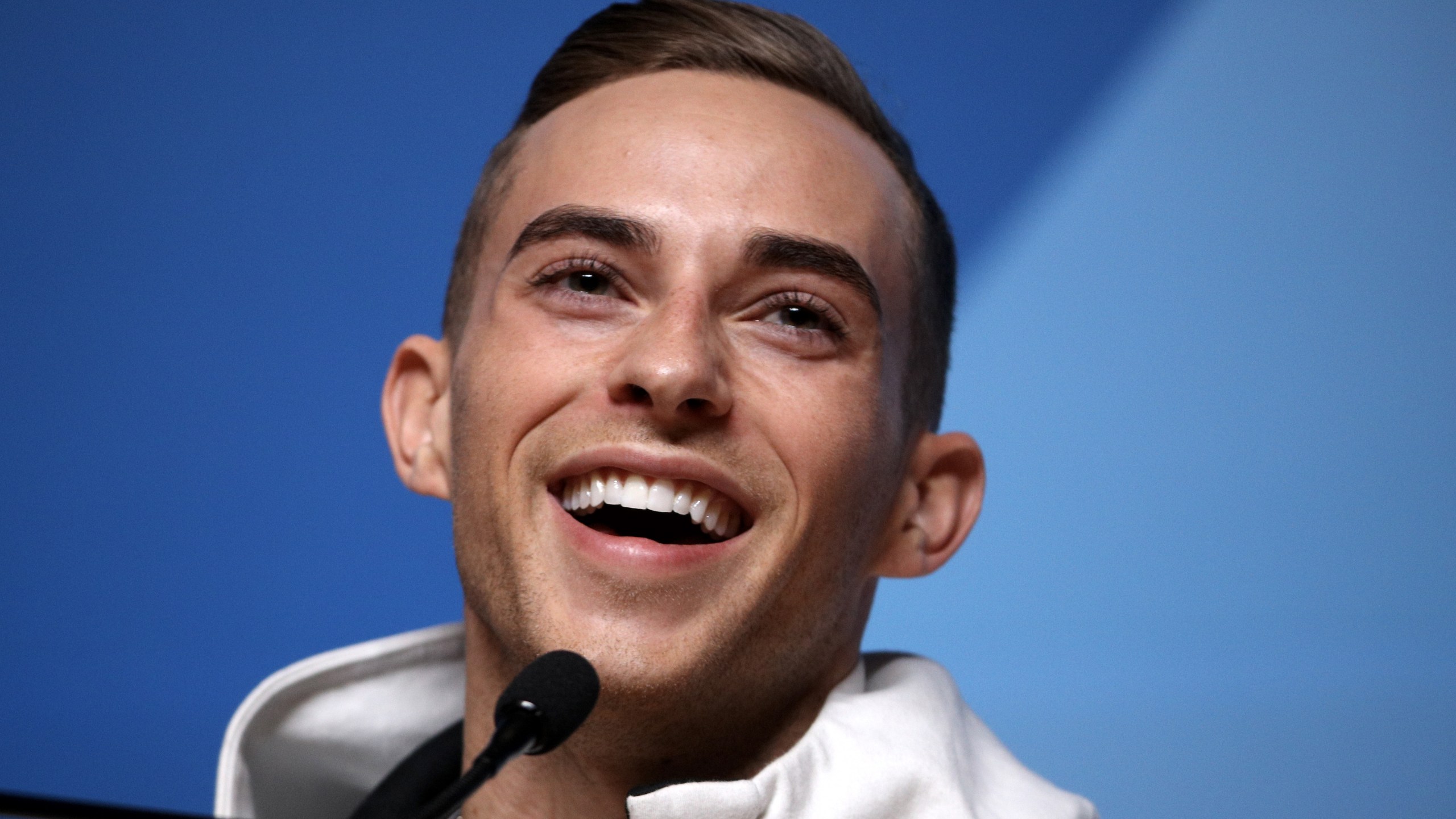 U.S. figure skater Adam Rippon speaks during a press conference on Feb. 13, 2018, in Pyeongchang-gun, South Korea. (Credit: Chris Graythen / Getty Images)