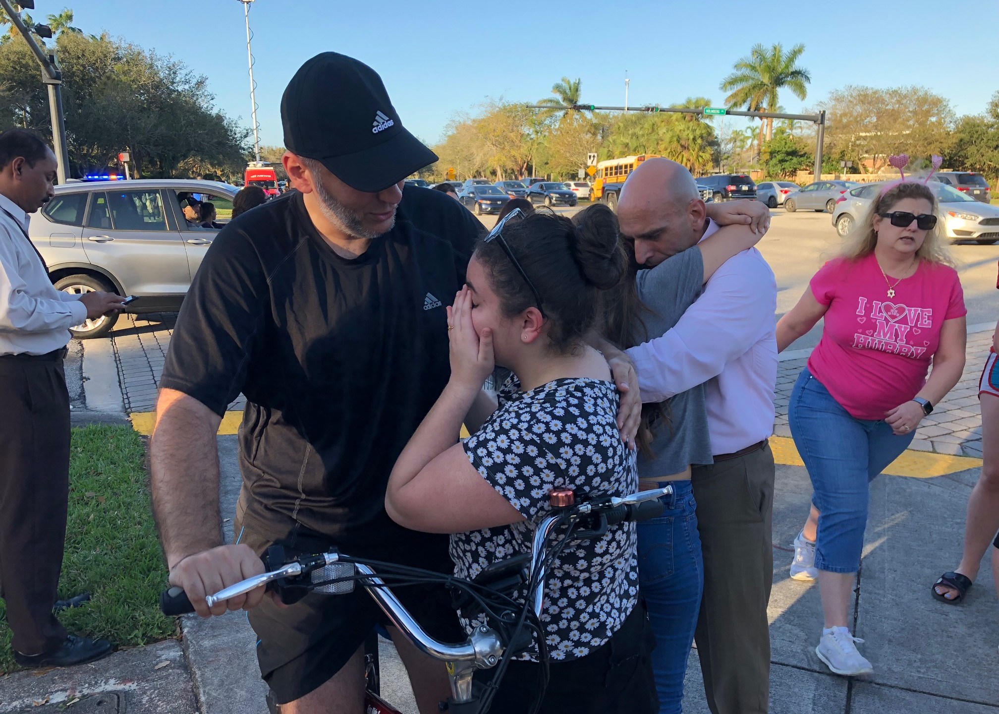 Parents and children are reunited after a deadly shooting at Marjory Stoneman Douglas High School in Parkland, Florida on Feb. 14, 2018. (Credit: Michele Eve Sandberg/AFP/Getty Images)