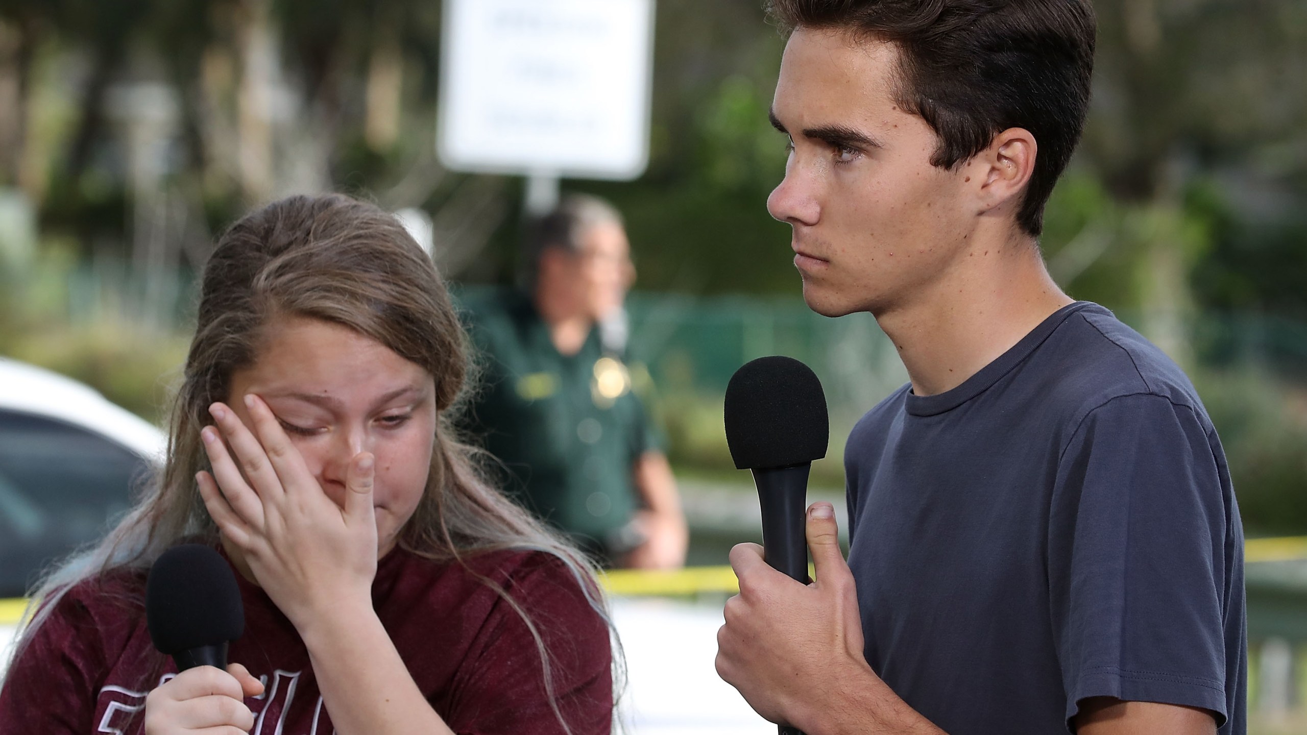 Students Kelsey Friend (L) and David Hogg recount their stories about the mass shooting at the Marjory Stoneman Douglas High School, where 17 people were killed on February 15, 2018 in Parkland, Florida. (Credit: Mark Wilson/Getty Images)