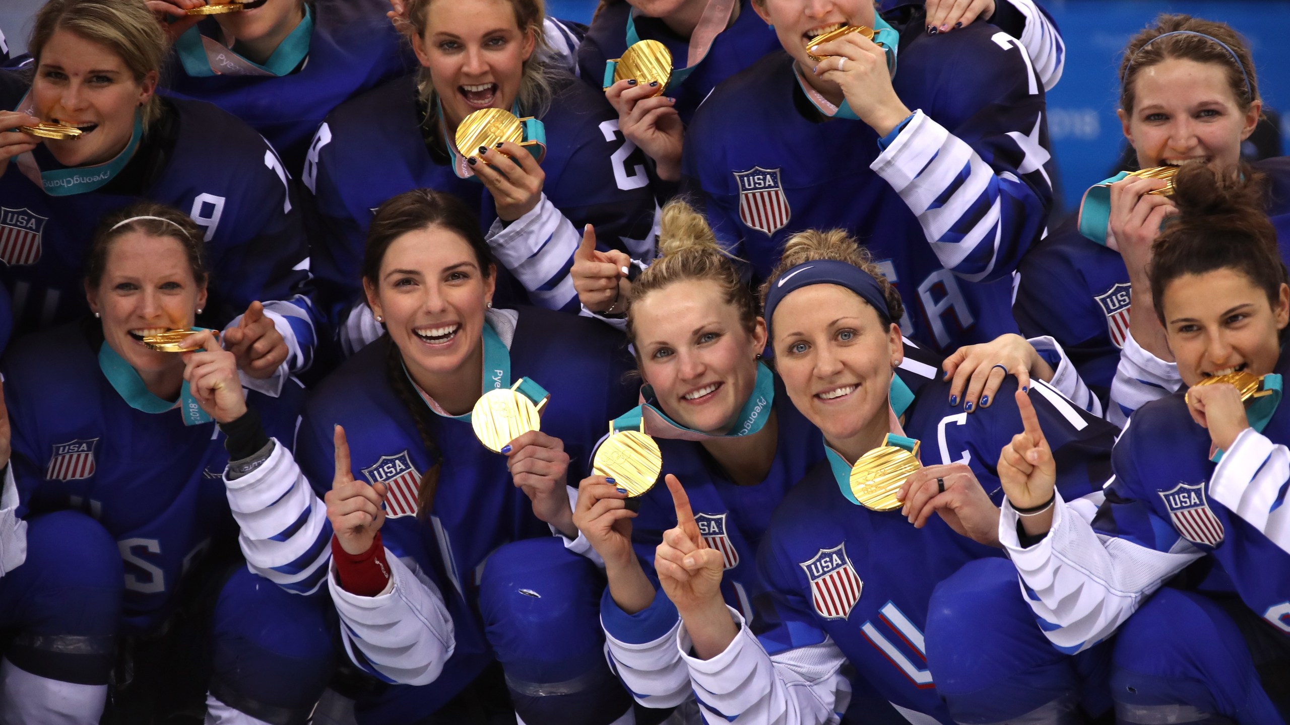 The U.S. team celebrate after defeating Canada in a shootout in the Women's Gold Medal Game on day thirteen of the PyeongChang 2018 Winter Olympic Games at Gangneung Hockey Centre on February 22, 2018 in Gangneung, South Korea. (Credit: Bruce Bennett/Getty Images)