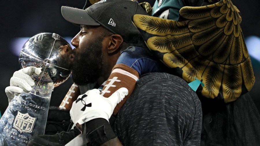 Malcolm Jenkins of the Philadelphia Eagles kisses the Vince Lombardi Trophy after defeating the New England Patriots 41-33 in Super Bowl LII at U.S. Bank Stadium on February 4, 2018 in Minneapolis, Minnesota. (Credit: Patrick Smith/Getty Images)