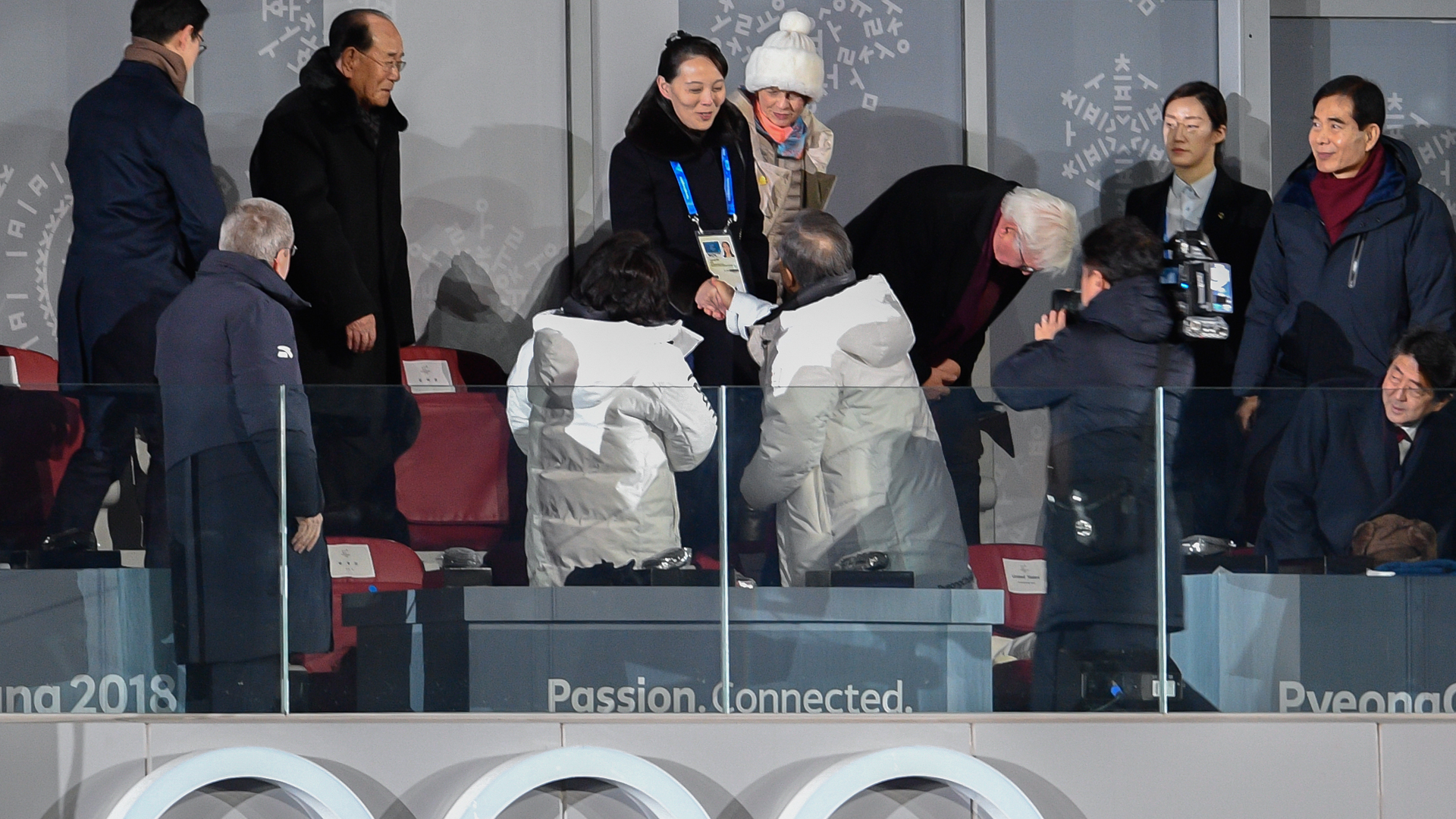 North Korea's Kim Jong Uns sister Kim Yo Jong (C) shakes hand with South Korea's President Moon Jae-in during the opening ceremony of the Pyeongchang 2018 Winter Olympic Games on February 9, 2018. (Credit: MARTIN BUREAU/AFP/Getty Images)