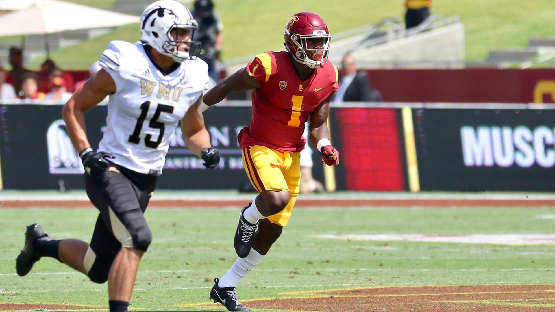 USC freshman receiver Joseph Lewis (1) runs downfield to cover a punt during a game against Western Michigan on Sept. 2. (Credit: Shotgun Spratling / Los Angeles Times)