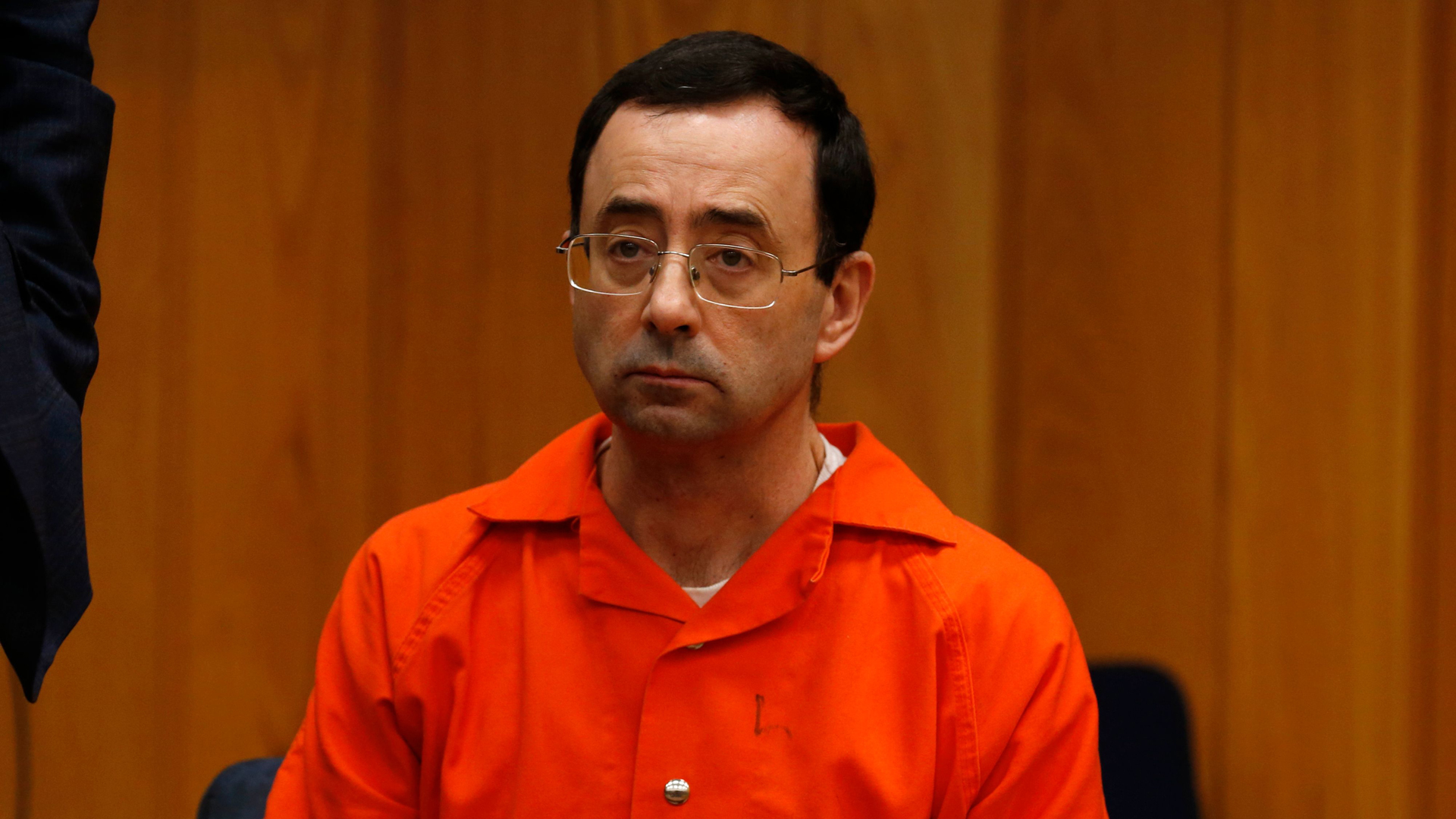 Former Michigan State University and USA Gymnastics doctor Larry Nassar listens during the sentencing phase in Eaton, County Circuit Court on January 31, 2018 in Charlotte, Michigan. (Credit: JEFF KOWALSKY/AFP/Getty Images)