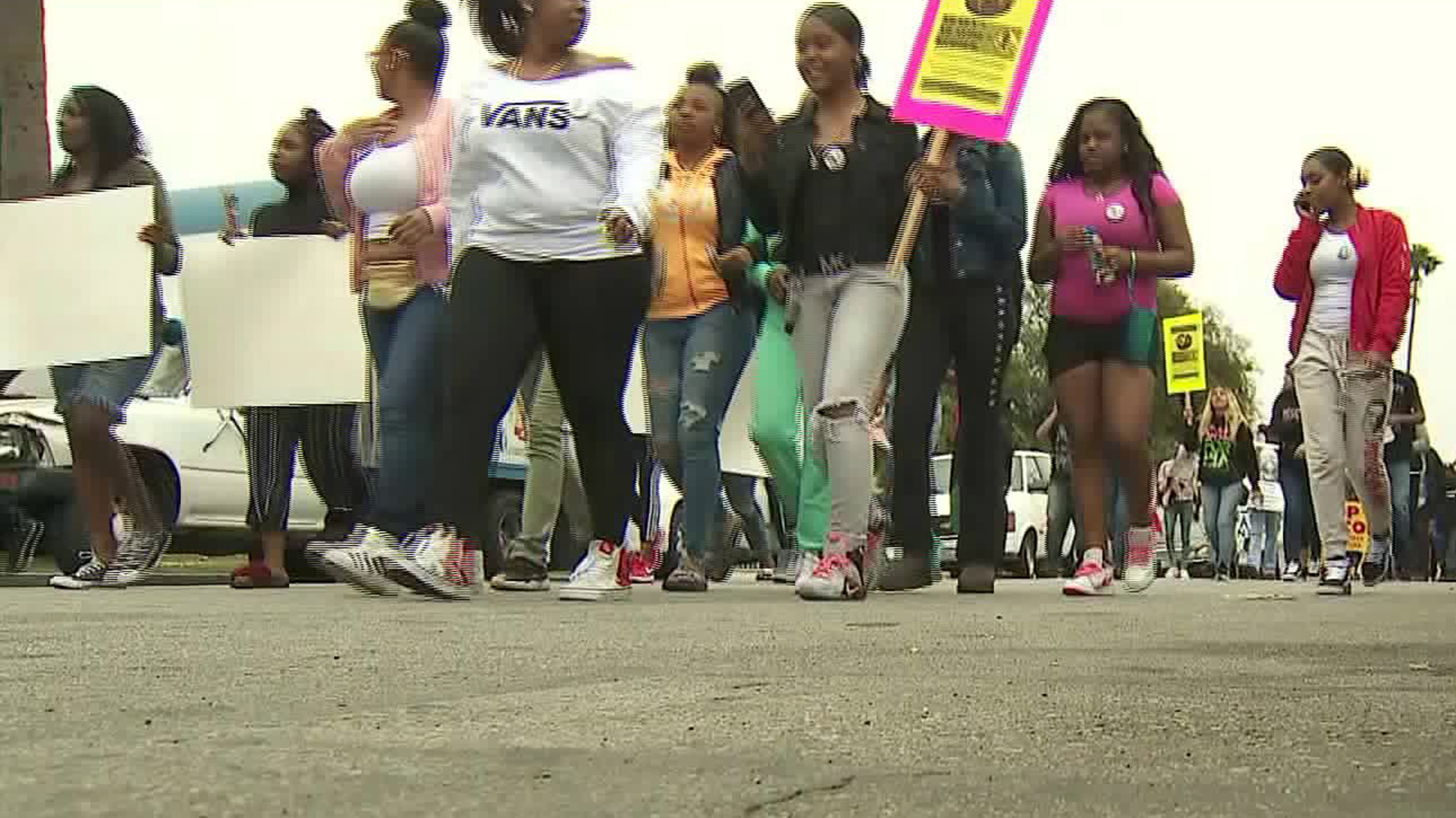 Protestors march in an area of South Los Angeles on Feb. 10, 2018, near where 16-year-old Anthony Weber was shot dead by an L.A. County sheriff's deputy nearly a week earlier, demanding answers in the teen's death. (Credit: KTLA)