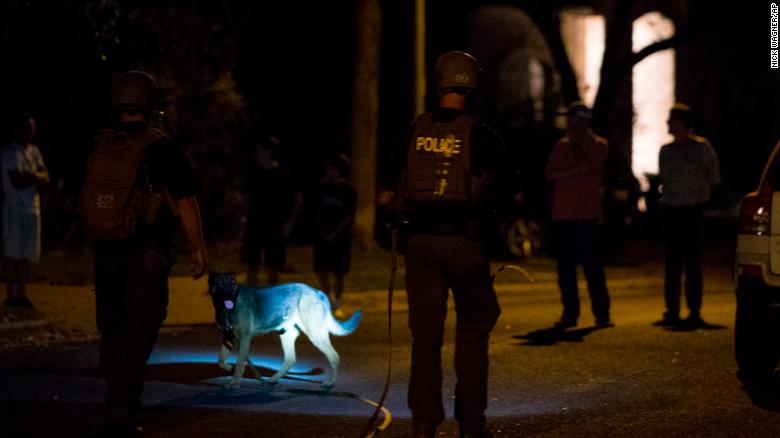 Austin police officials investigate after two men were injured in an explosion on March 18, 2018. (Credit: Austin Police Department)