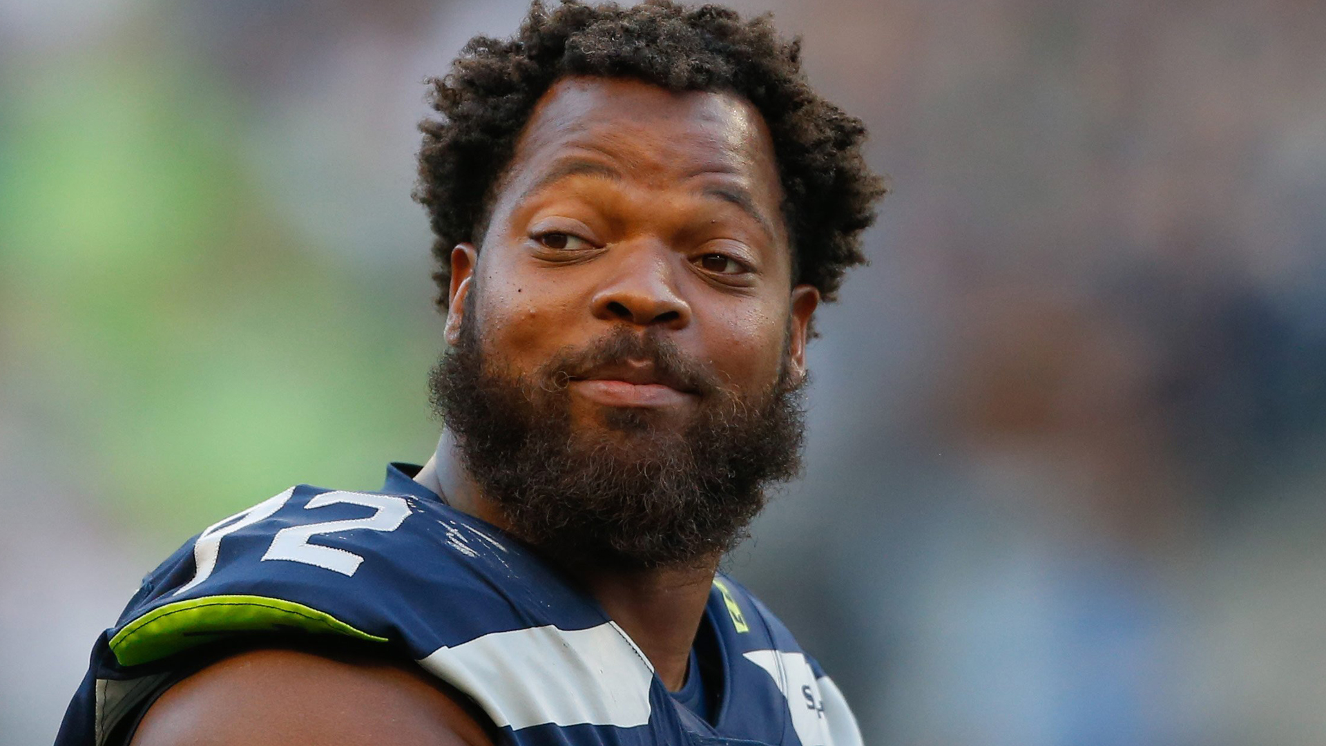 Defensive end Michael Bennett just signed a contract with the Philadelphia Eagles. He has been accused of injuring a 66-year-old woman in a wheelchair while rushing the field during the 2017 Super Bowl, as CNN reported March 23, 2018. (Credit: Otto Greule Jr./Getty Images via CNN)