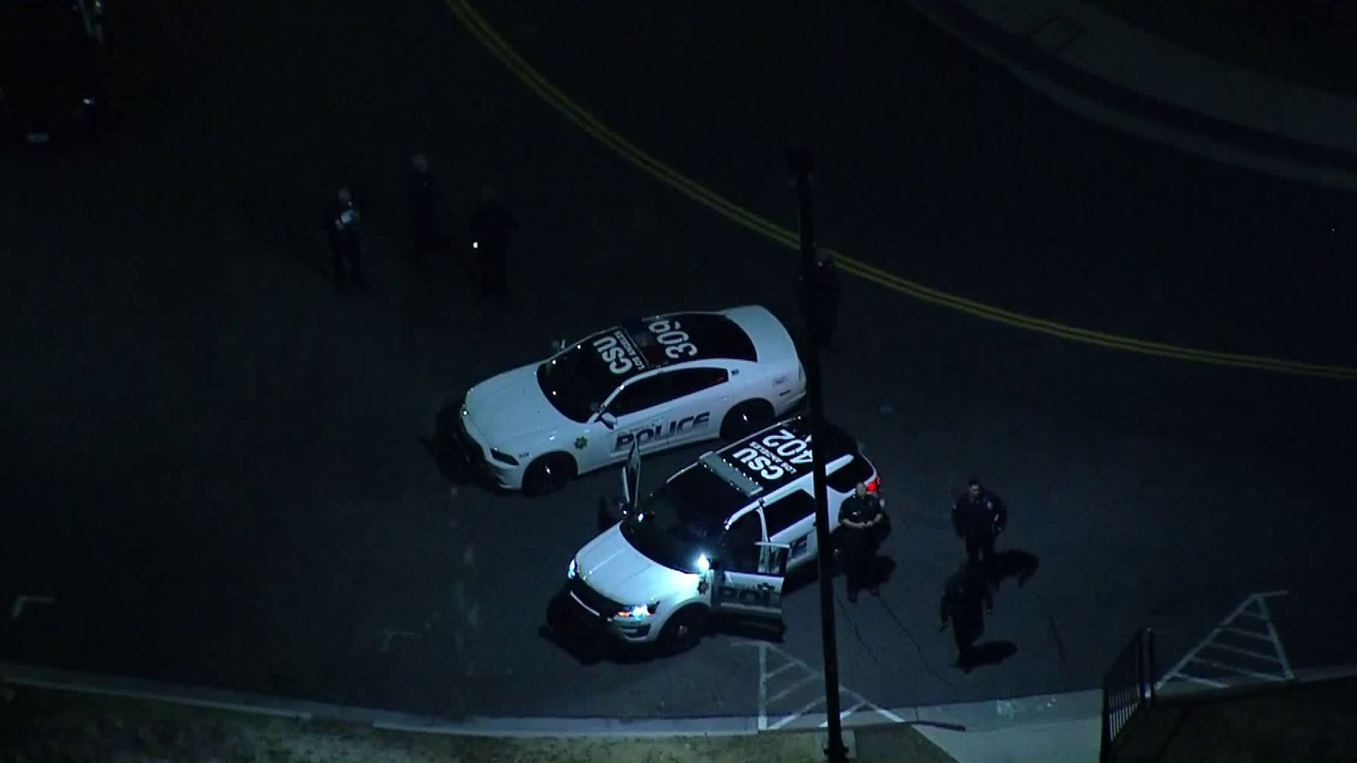 Officers respond to a scene at California State University, Los Angeles where campus police said they shot a coyote after an attack on March 14, 2018. (Credit: KTLA)