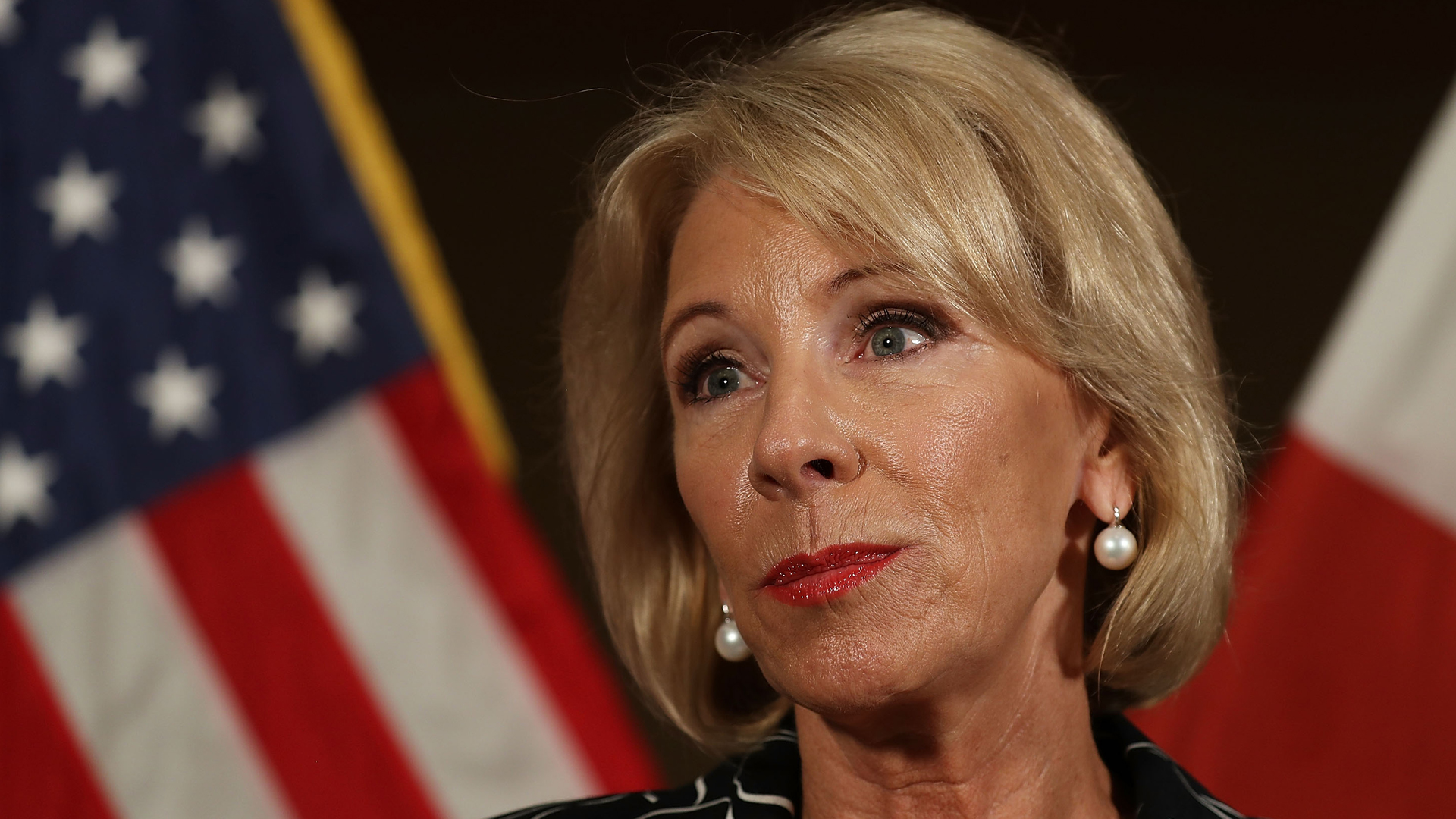 Education Secretary Betsy DeVos speaks to the media during a press conference held in Coral Springs, Florida, about her visit to Marjory Stoneman Douglas High School on March 7, 2018. (Credit: Joe Raedle / Getty Images)