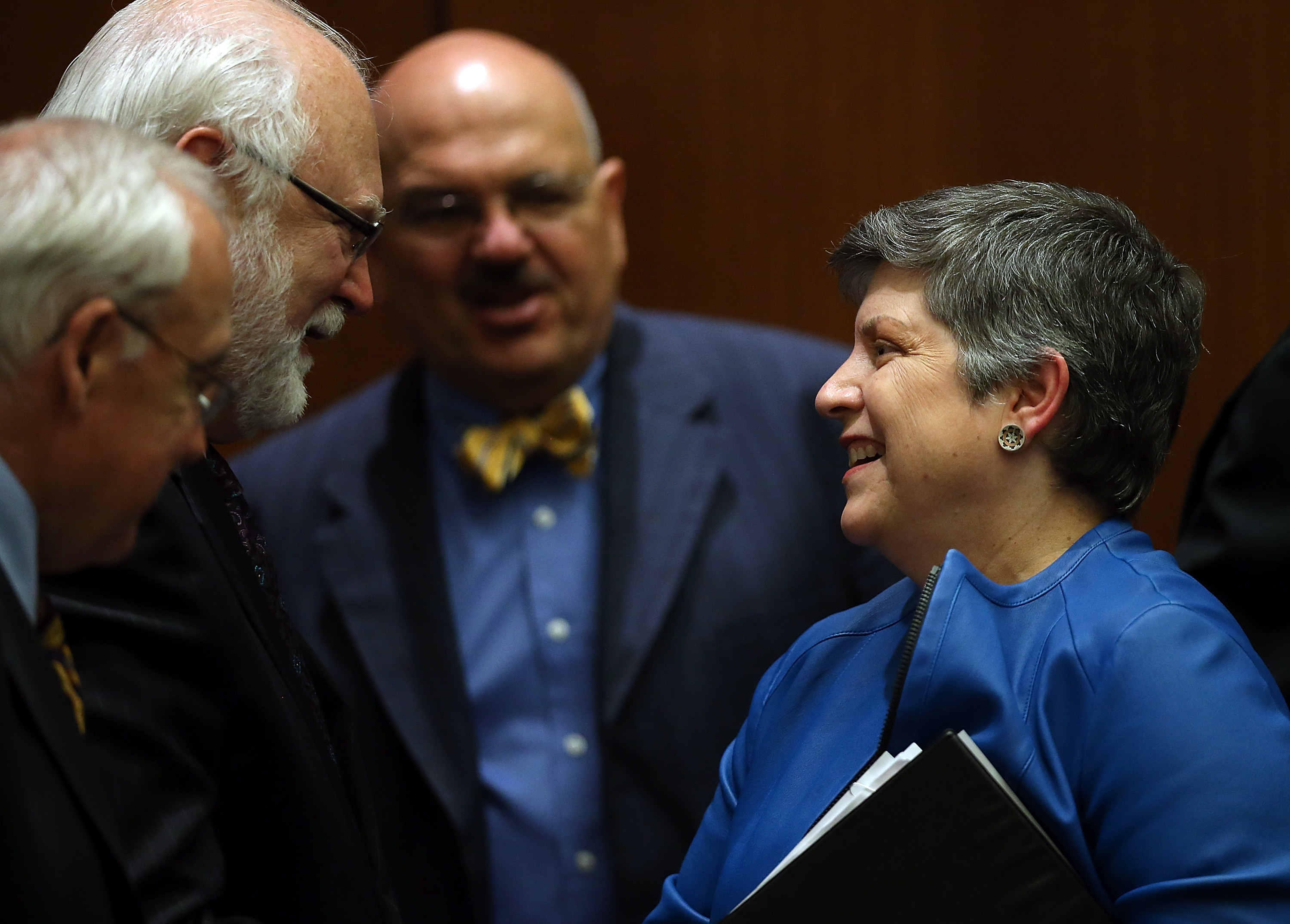 Former Department of Homeland Security secretary Janet Napolitano talks with UC regents after she was elected to be president of the University of California during its Board of Regents meeting on July 18, 2013, in San Francisco. (Credit: Justin Sullivan/Getty Images)