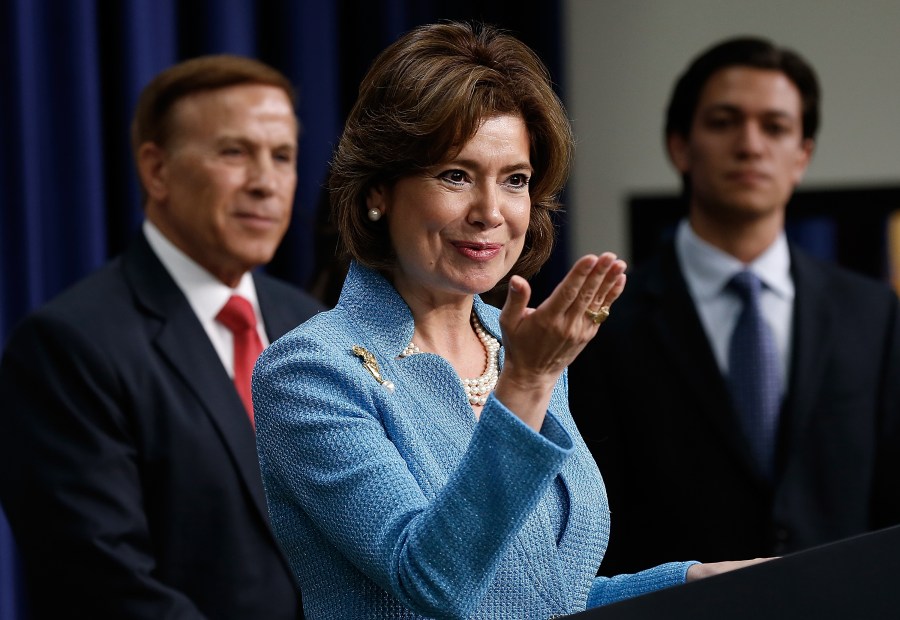 Maria Contreras-Sweet, center, speaks after being sworn in as administrator of the Small Business Administration on April 7, 2014, in Washington, DC. (Credit: Win McNamee / Getty Images)