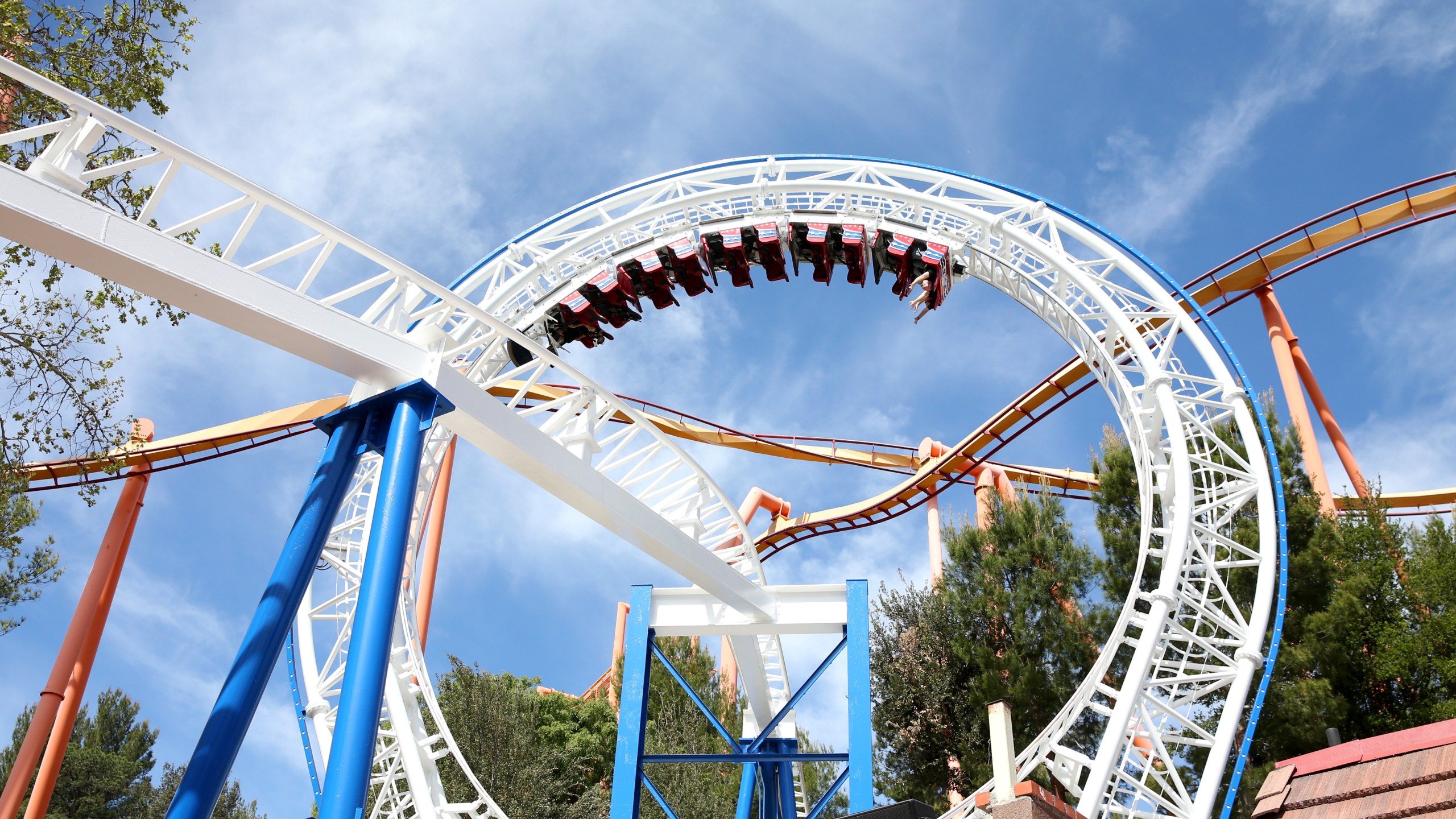 Guests ride the first virtual reality coaster powered by Samsung Gear VR at Six Flags Magic Mountain on March 25, 2016, in Valencia. (Credit: Jonathan Leibson/Getty Images for Samsung)