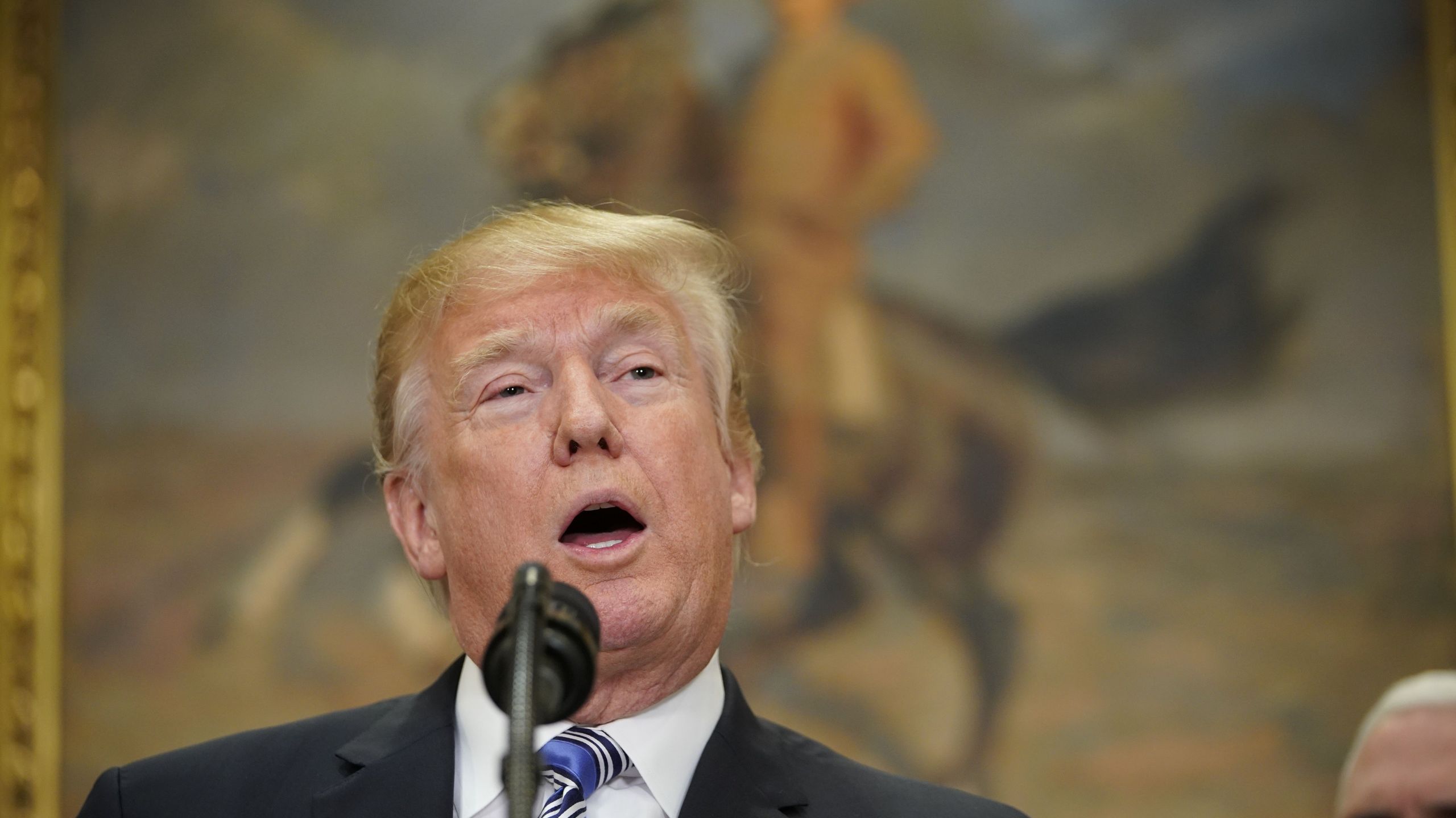 Donald Trump speaks before signing Section 232 Proclamations on Steel and Aluminum Imports in the Oval Office on March 8, 2018. (Credit: Jonah Mandel/AFP/Getty Images)