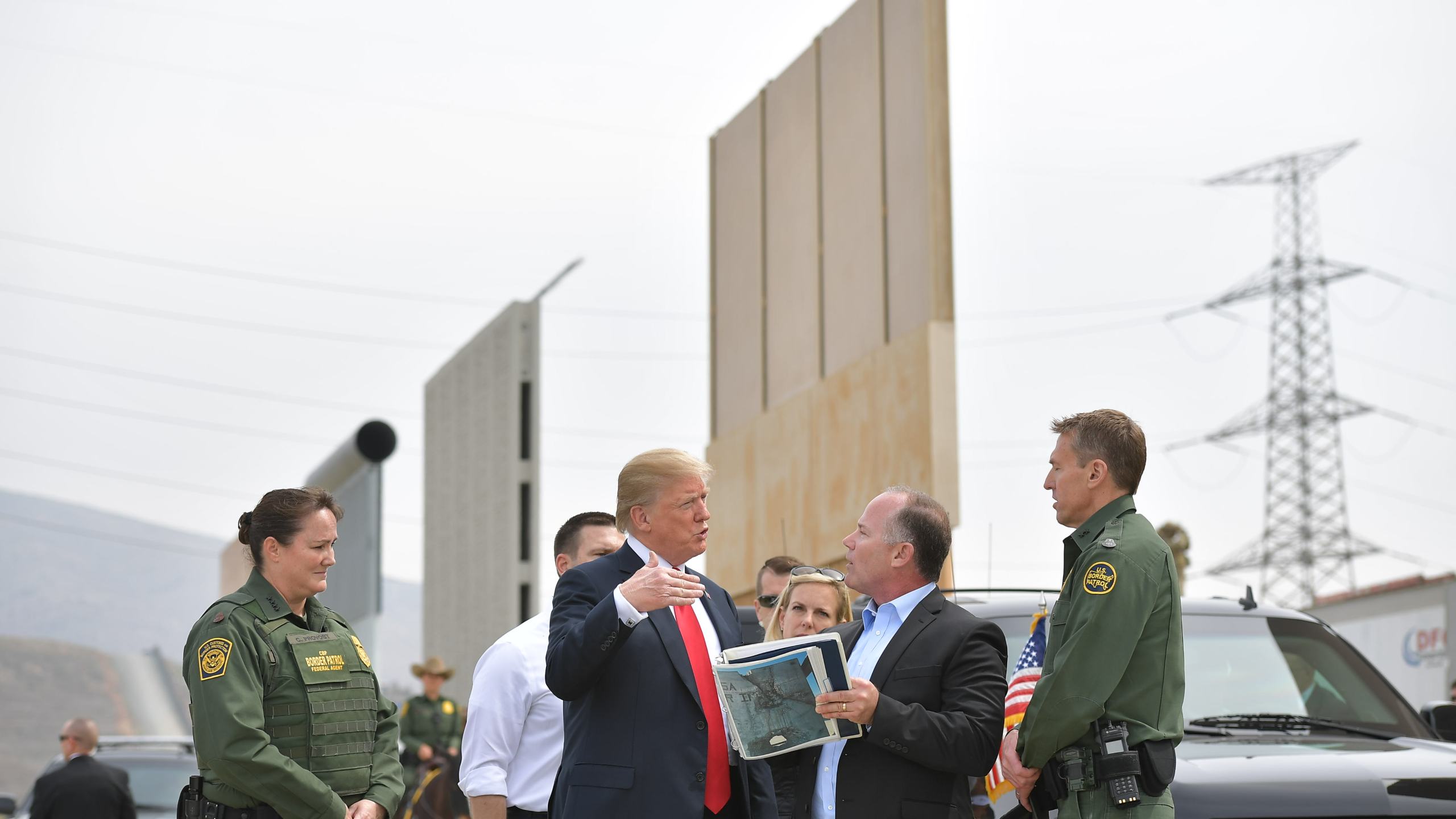 President Donald Trump inspects border wall prototypes in San Diego on March 13, 2018. (Credit: MANDEL NGAN/AFP/Getty Images)