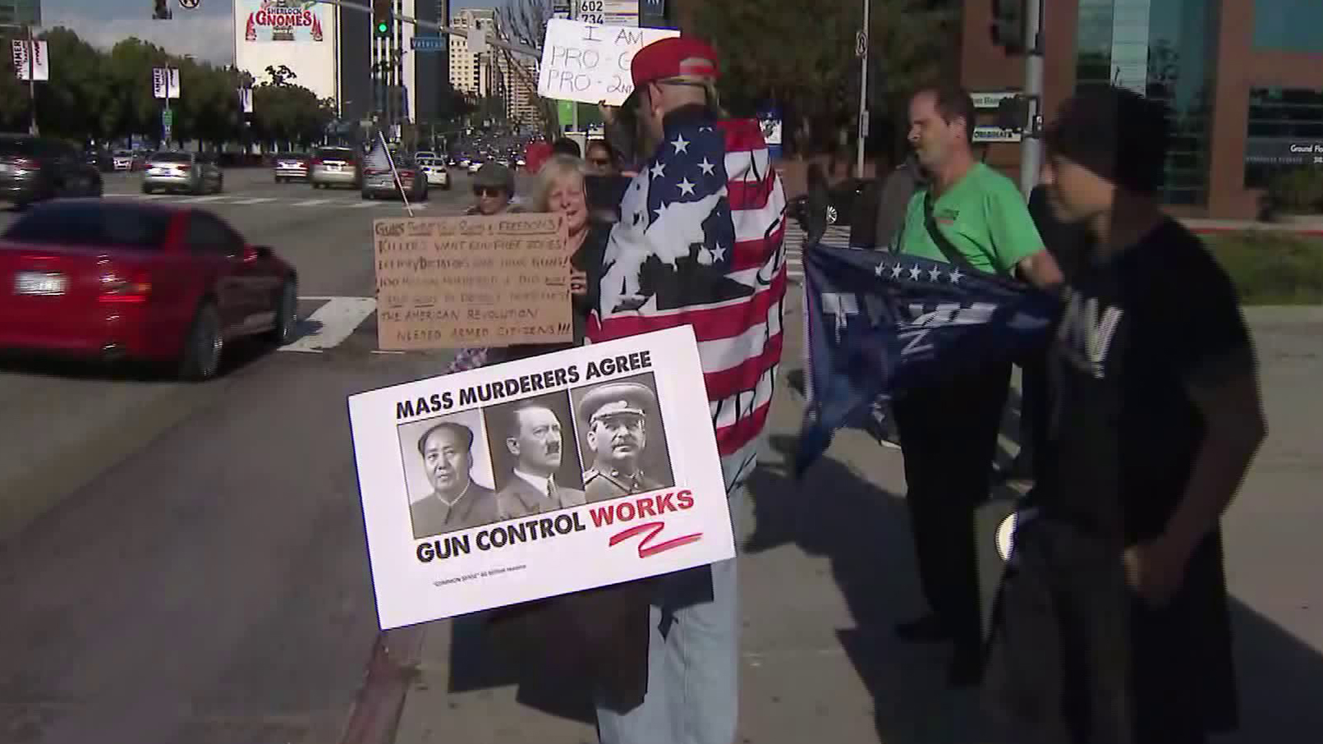 Gun rights advocates rallied in Westwood in a protest that appeared considerably smaller than the massive crowds seen around the nation as March for Our Lives protests unfolded that same day on March 24, 2018. (Credit: KTLA)