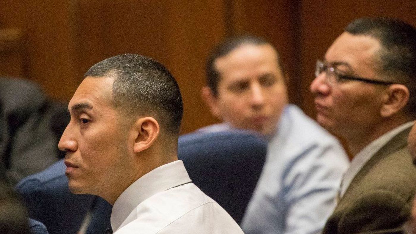 From left, Melvin Sandoval, sits alongside Rogelio Contreras and Santos Grimaldi during the closing arguments of their trial, where they stood accused of kidnapping, raping and killing a 13-year-old girl found shot to death in Elysian Park. (Credit: Allen J. Schaben / Los Angeles Times)