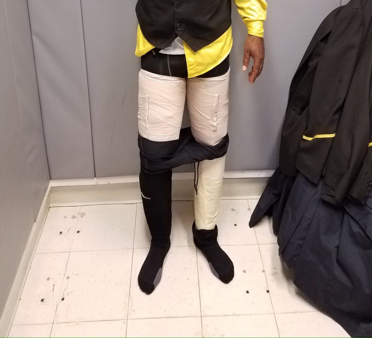 An airline's crew member was caught with nine pounds of cocaine taped to his legs. (Credit: U.S. Customs and Border Protection)