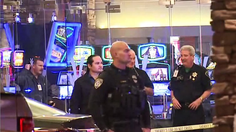 Police surround the entrance of the Valley View Casino in San Diego County after a pursuit ended in a police shooting there on March 17, 2018. (Credit: KSWB)