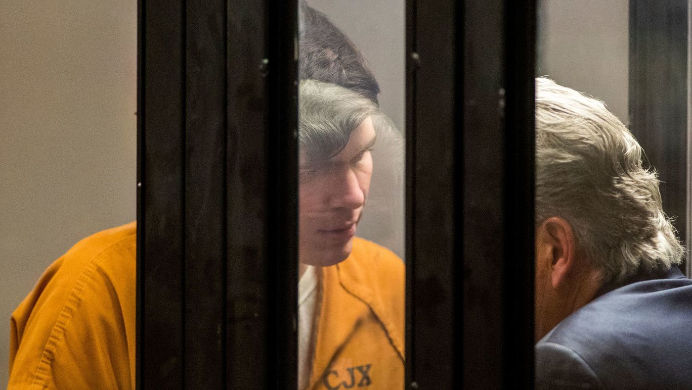 Samuel Woodward speaks to his attorney, Edward Munoz, during his February arraignment. (Credit: Allen J. Schaben / Los Angeles Times)