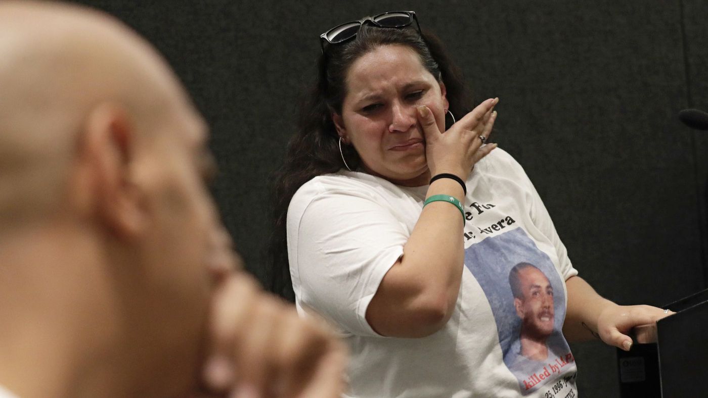 Valerie Rivera, the mother of Eric Rivera, sobs after addressing the L.A. Police Commission on April 10, 2018. (Credit: Irfan Khan / Los Angeles Times)