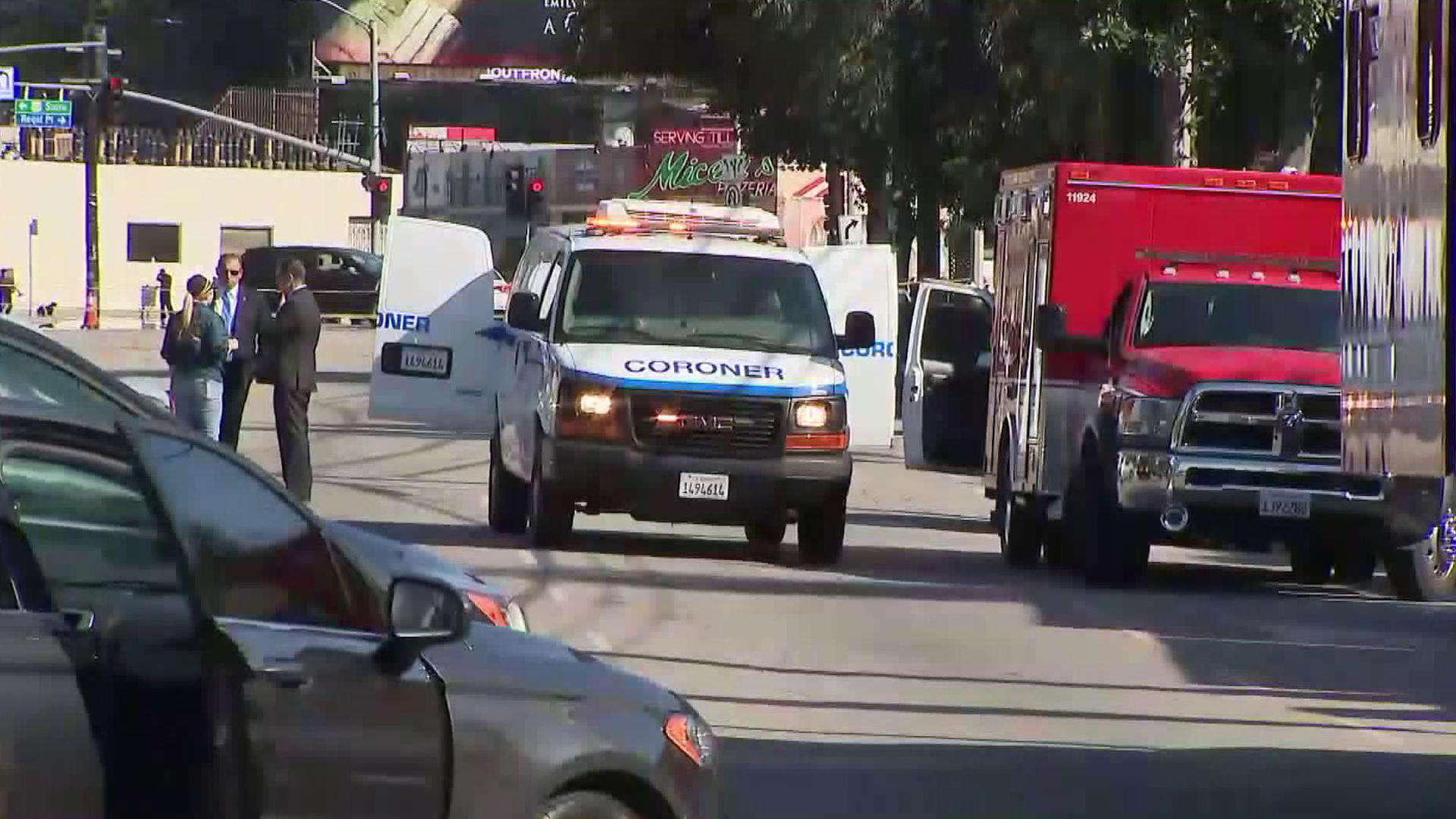 A coroner's van arrives at the scene of a fire that left two dead in Studio City on April 14, 2018. (Credit: KTLA)