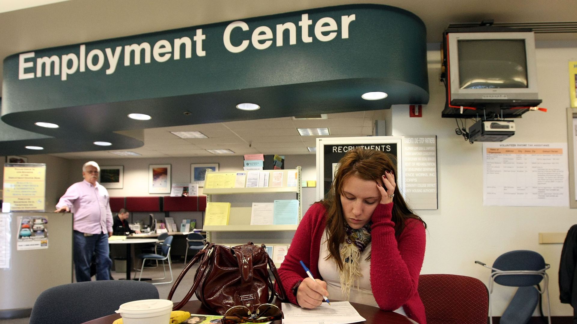 A woman fills out paperwork at an employment center in this file photo. (Credit: KTLA)